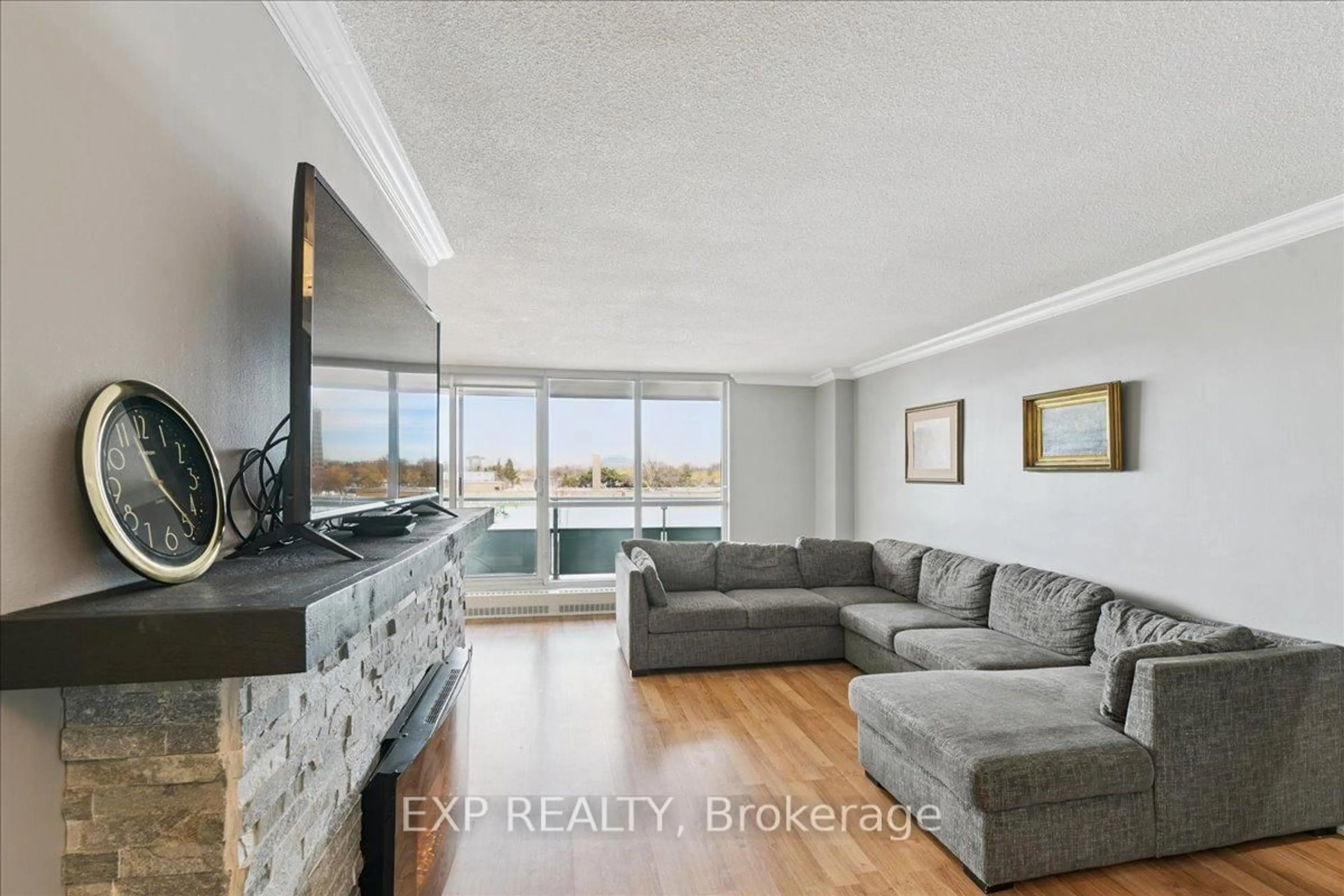 Living room with furniture, unknown for 44 Longbourne Dr #412, Toronto Ontario M9R 2M7