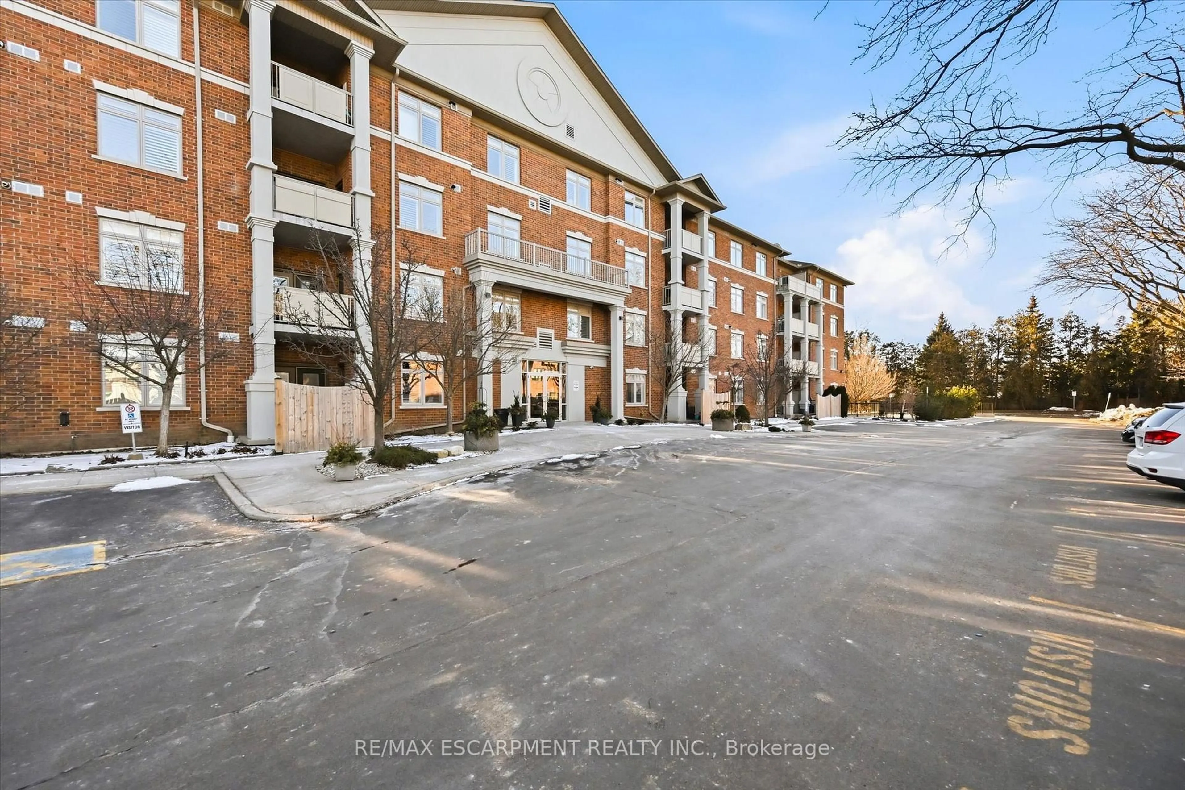 A pic from outside/outdoor area/front of a property/back of a property/a pic from drone, unknown for 391 Plains Rd #106, Burlington Ontario L7T 4M2