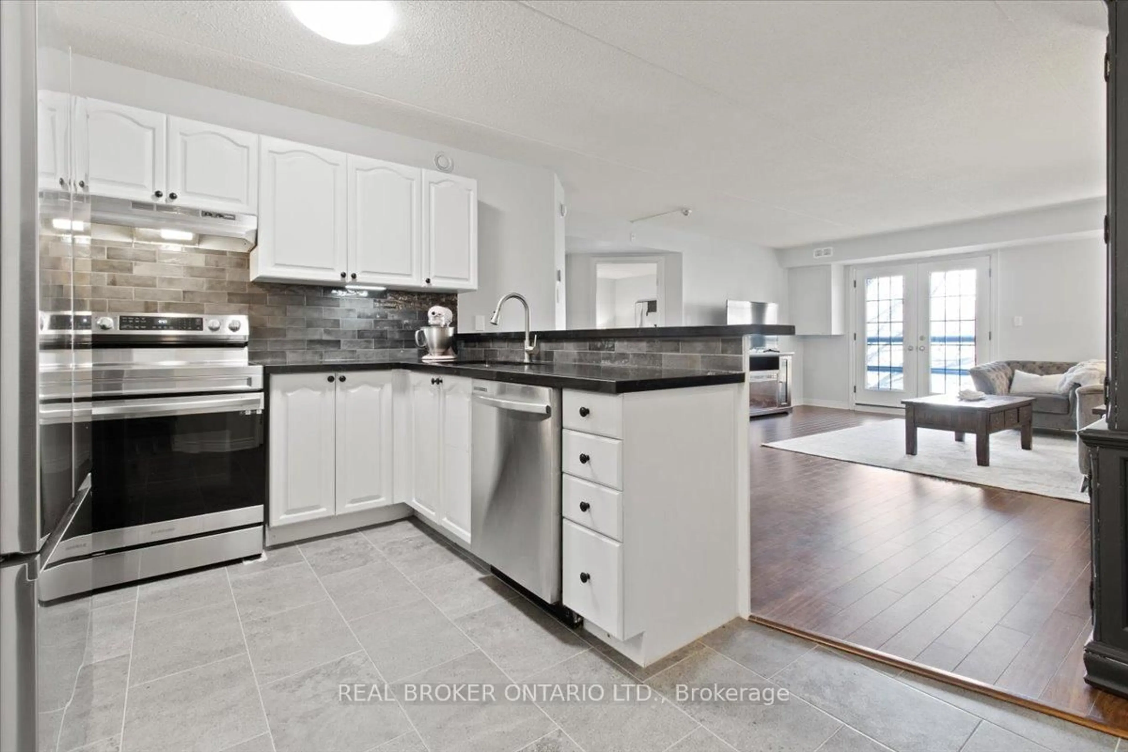 Open concept kitchen, ceramic/tile floor for 2010 Cleaver Ave #214, Burlington Ontario L7M 4C1