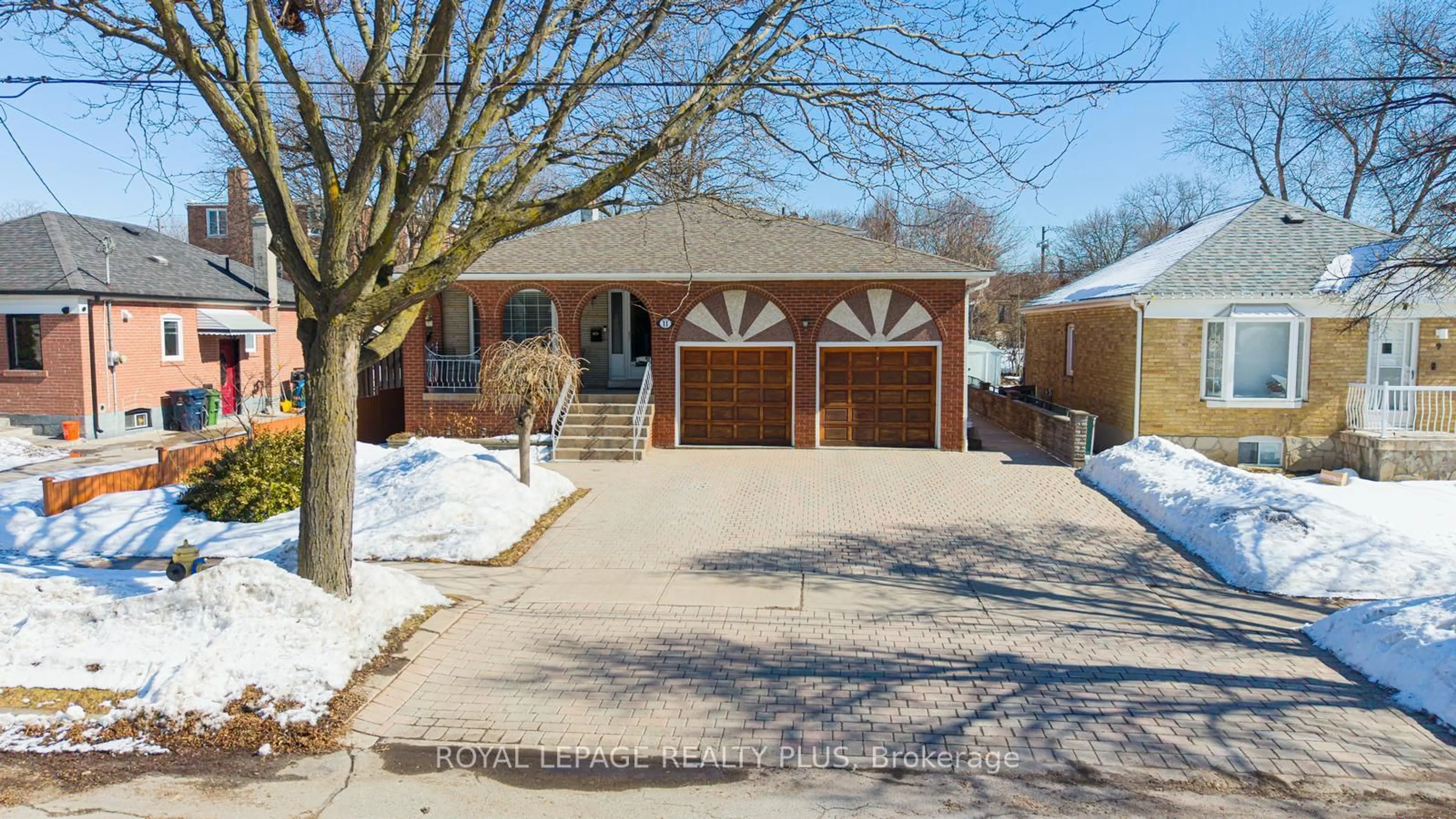 Home with brick exterior material, street for 11 Ranwood Dr, Toronto Ontario M9N 3E8