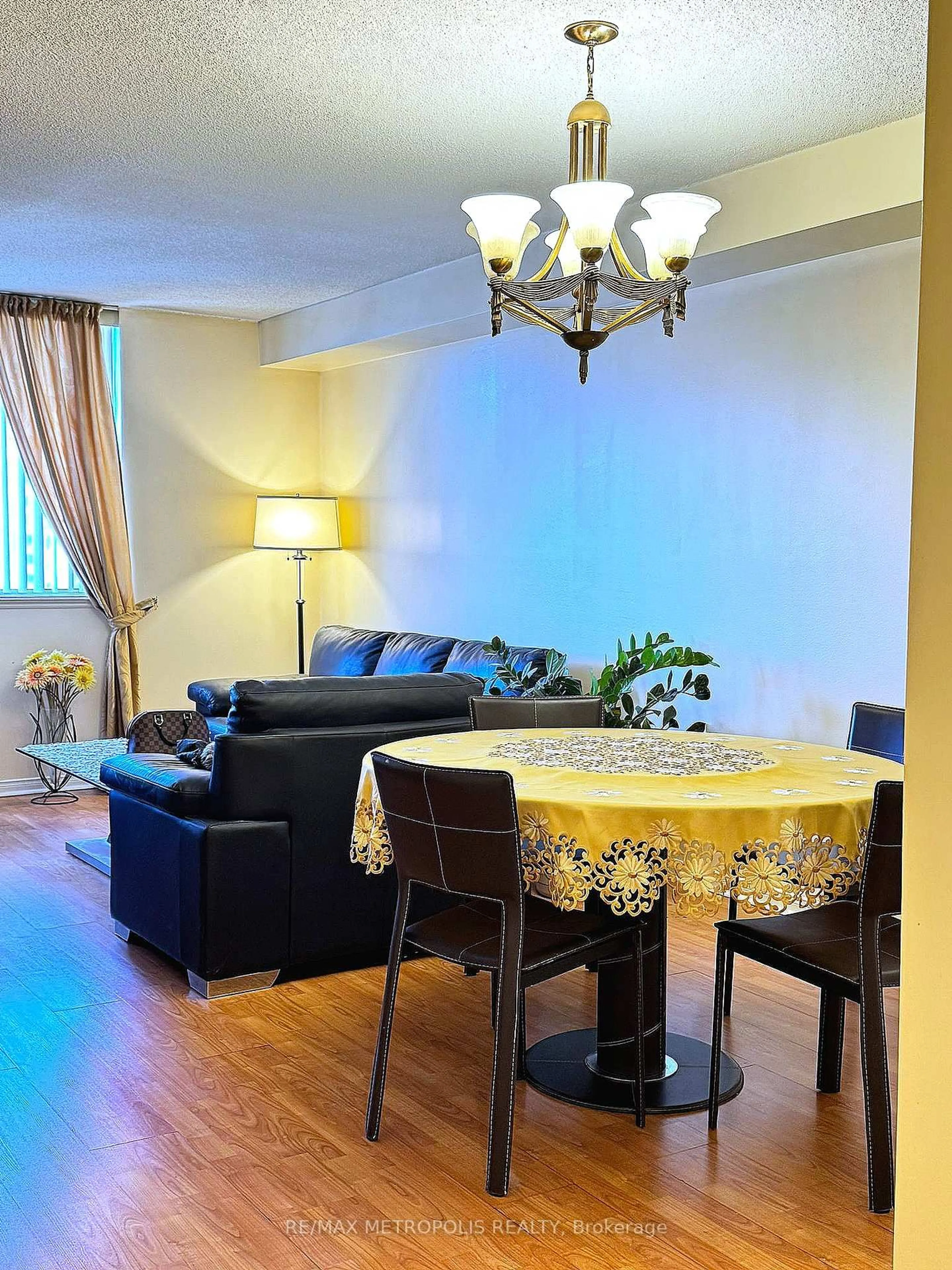 Living room with furniture, wood/laminate floor for 234 Albion Rd #806, Toronto Ontario M9W 6A5