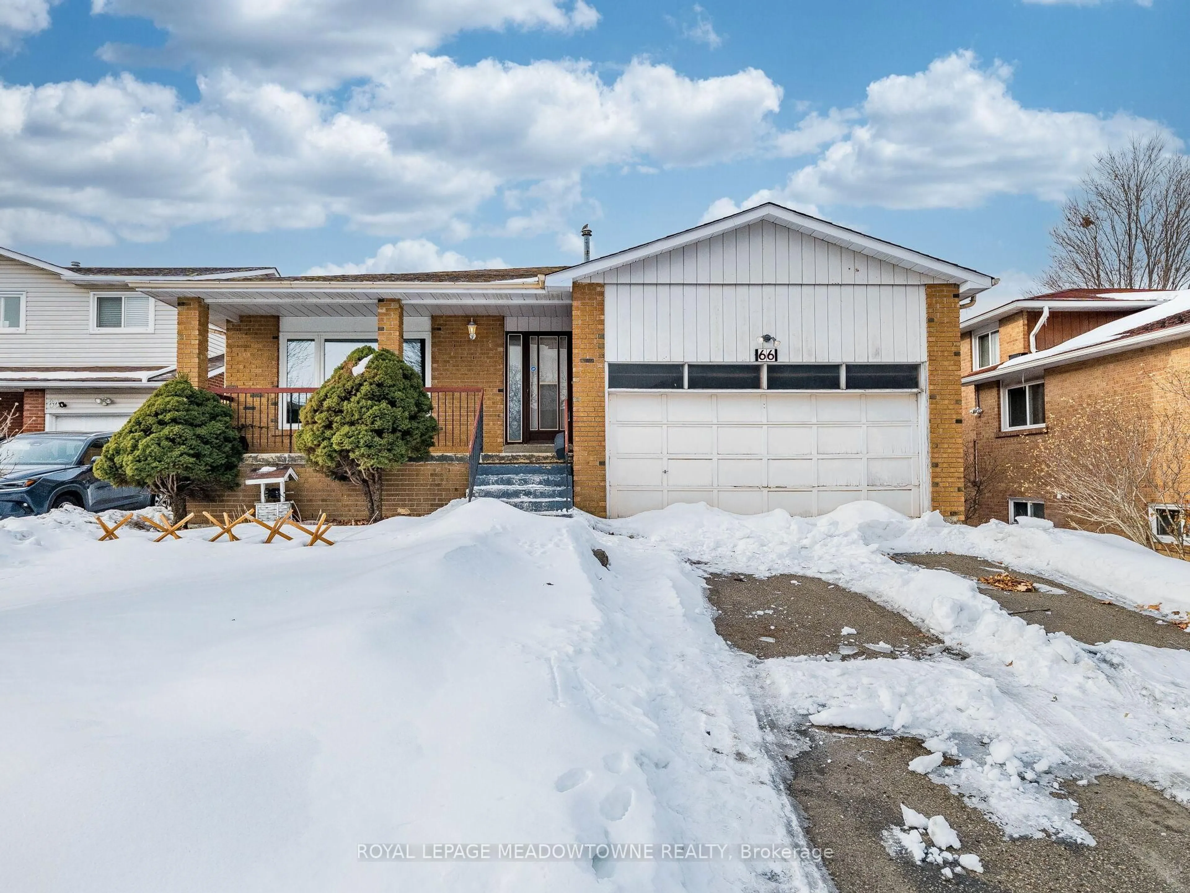 Home with vinyl exterior material, street for 66 Pluto Dr, Brampton Ontario L6V 3W5