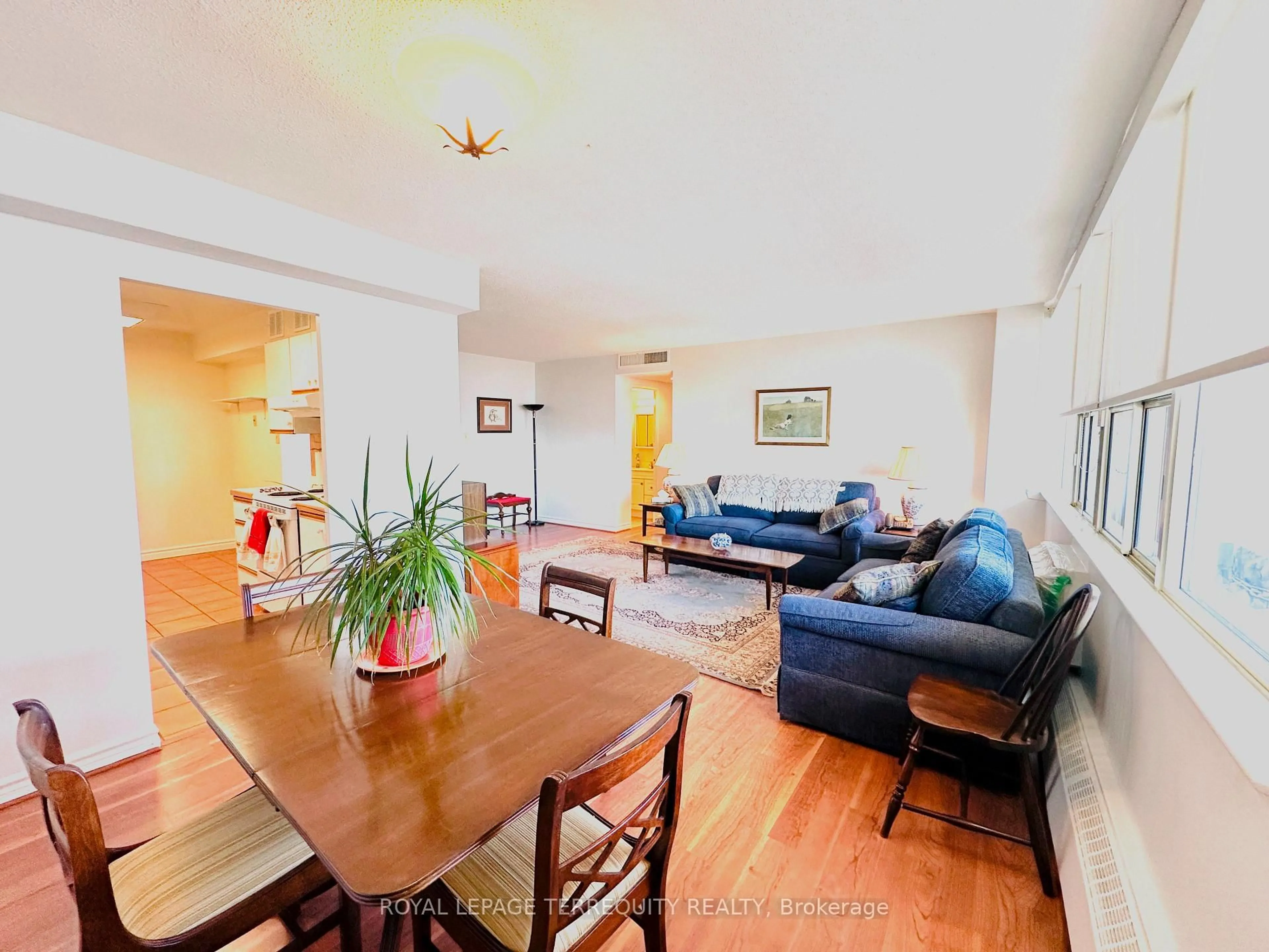 Living room with furniture, wood/laminate floor for 155 Marlee Ave #2212, Toronto Ontario M6B 4B5
