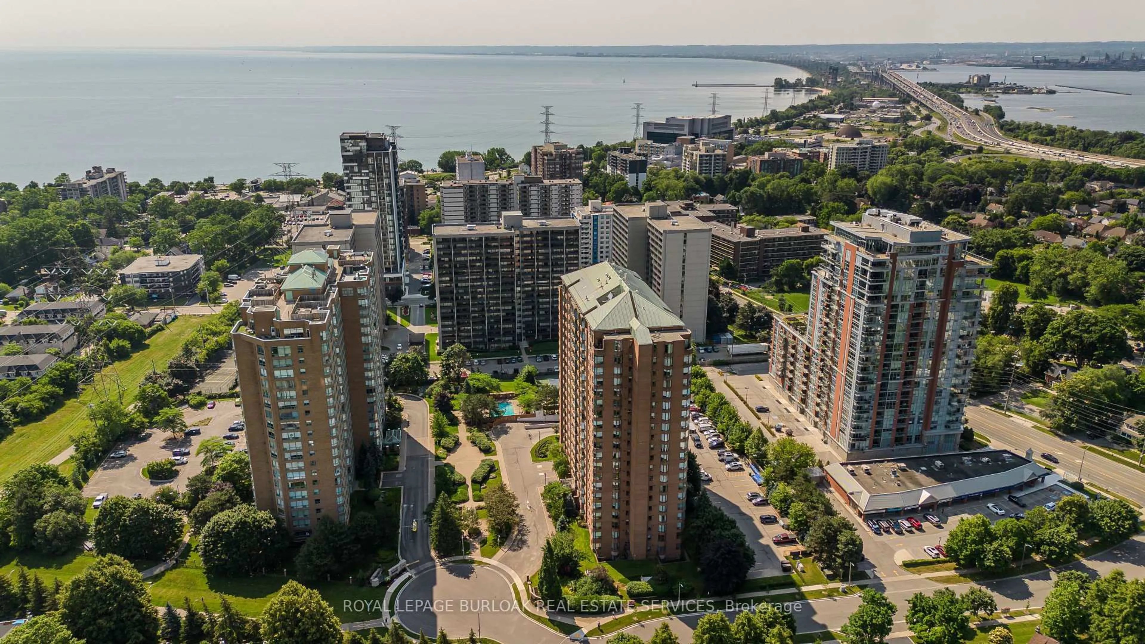 A pic from outside/outdoor area/front of a property/back of a property/a pic from drone, city buildings view from balcony for 1276 Maple Crossing Blvd #511, Burlington Ontario L7S 2J9