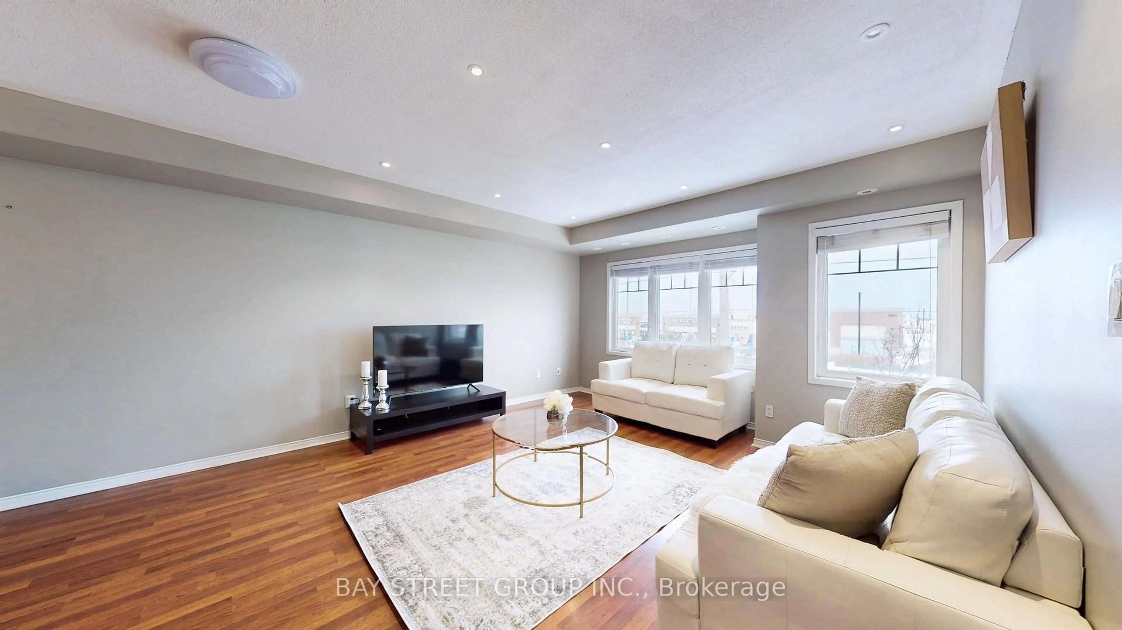 Living room with furniture, wood/laminate floor for 3975 Eglinton Ave #13, Mississauga Ontario L5M 0E7