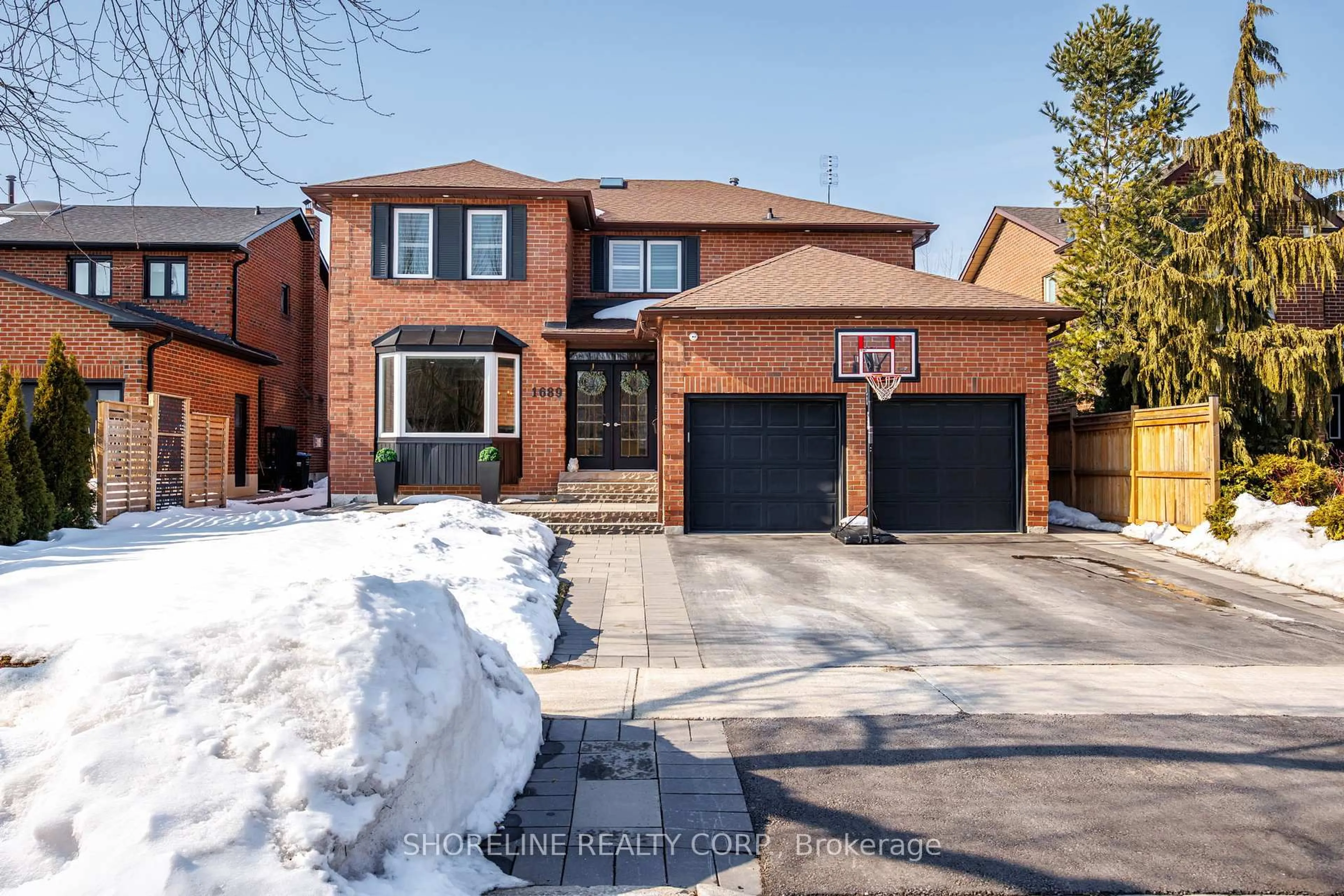 Home with brick exterior material, street for 1689 Copseholm Tr, Mississauga Ontario L4W 2C1