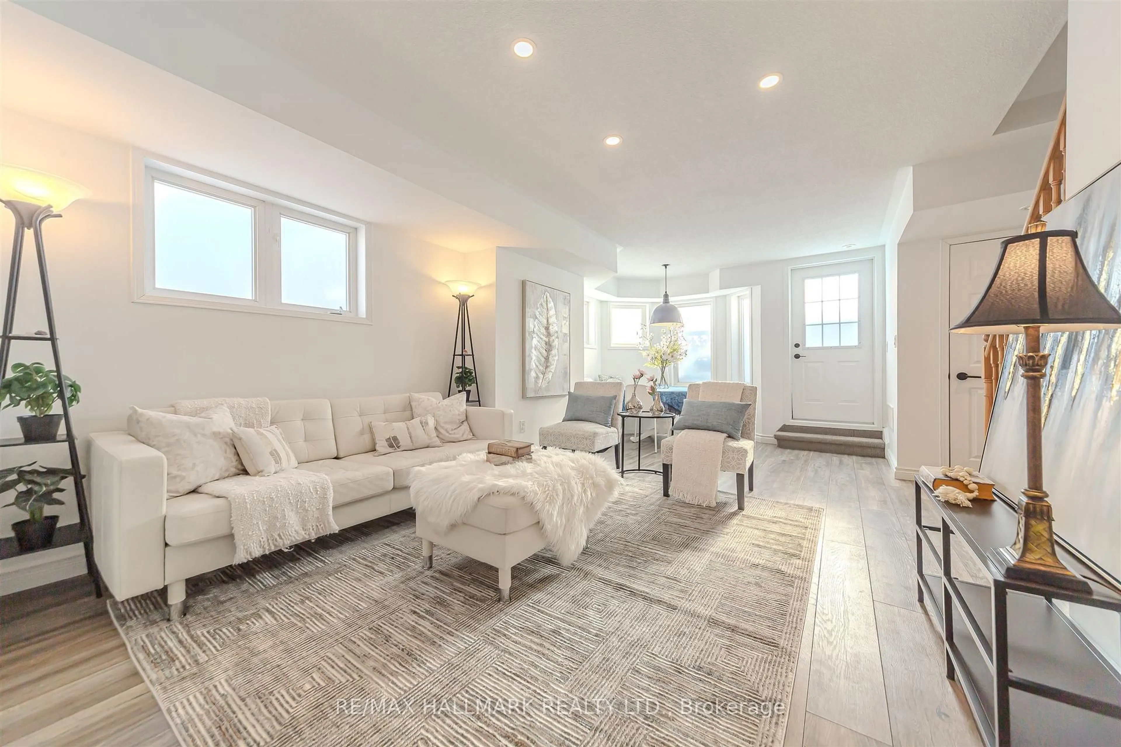 Living room with furniture, unknown for 10 Turntable Cres #101, Toronto Ontario M6H 4K9