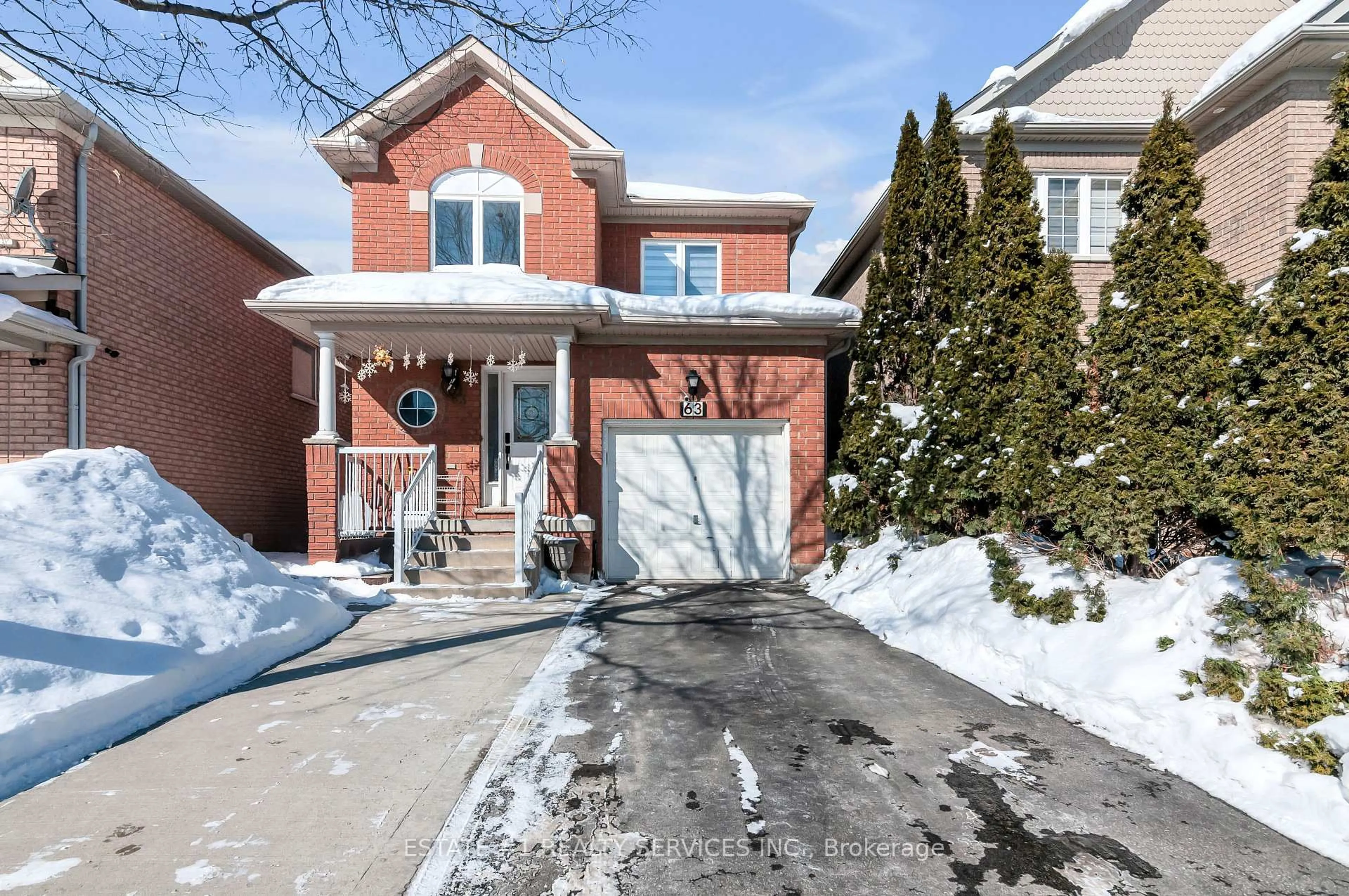 Home with brick exterior material, street for 63 Tideland Dr, Brampton Ontario L7A 2W1