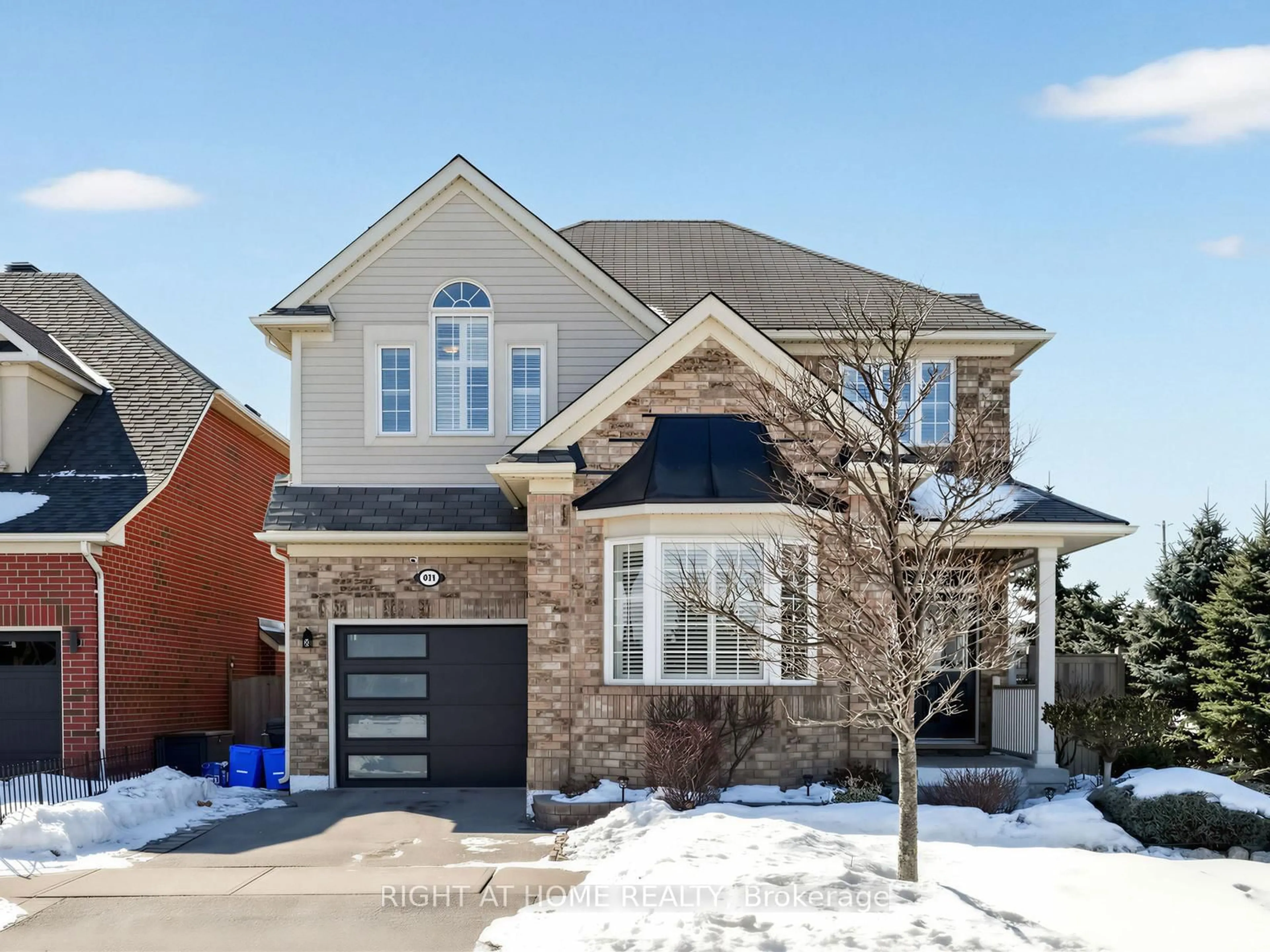 Home with brick exterior material, street for 401 TONELLI Lane, Milton Ontario L9T 0N4