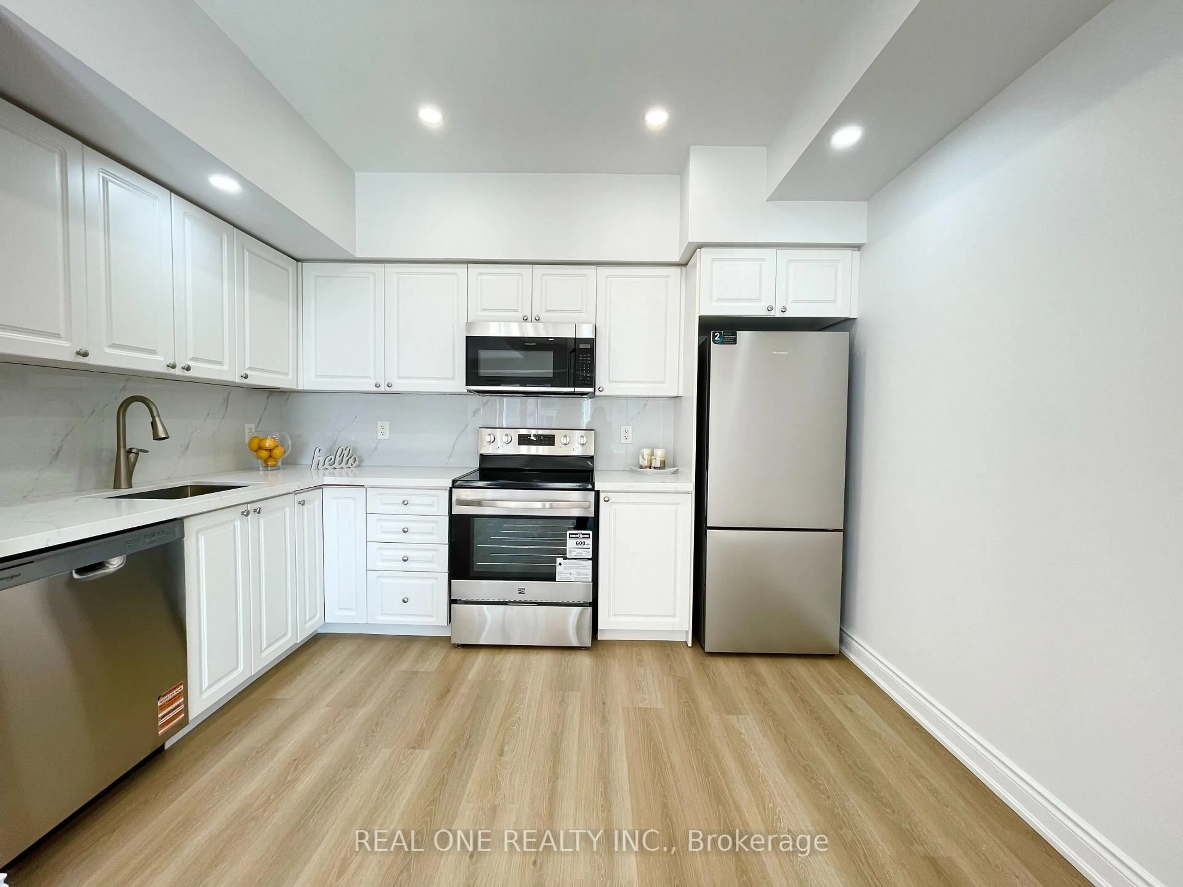 Standard kitchen, wood/laminate floor for 25 Richgrove Dr #217, Toronto Ontario M9R 0A3
