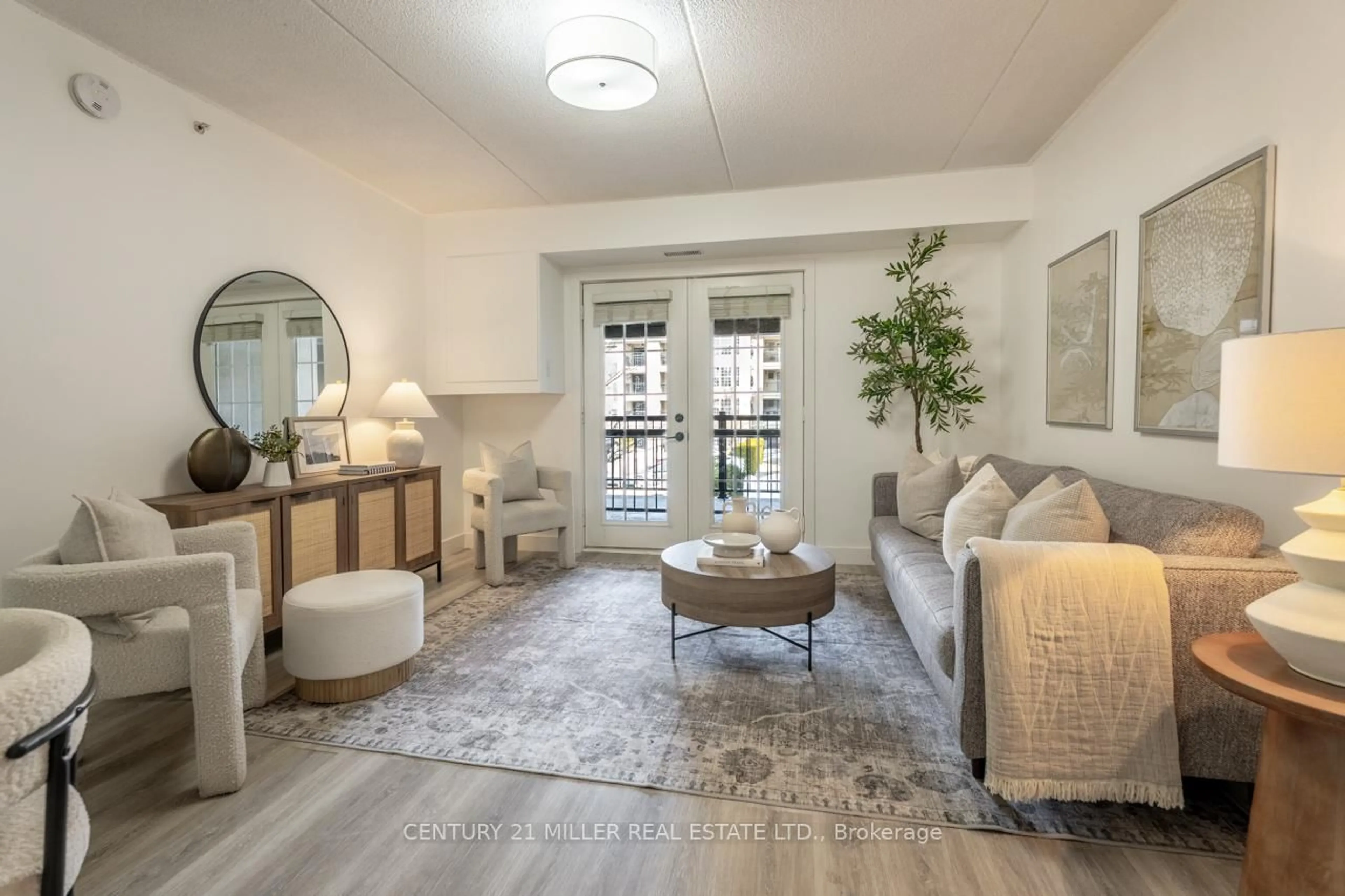 Living room with furniture, unknown for 1487 Maple Ave #208, Milton Ontario L9T 0B7