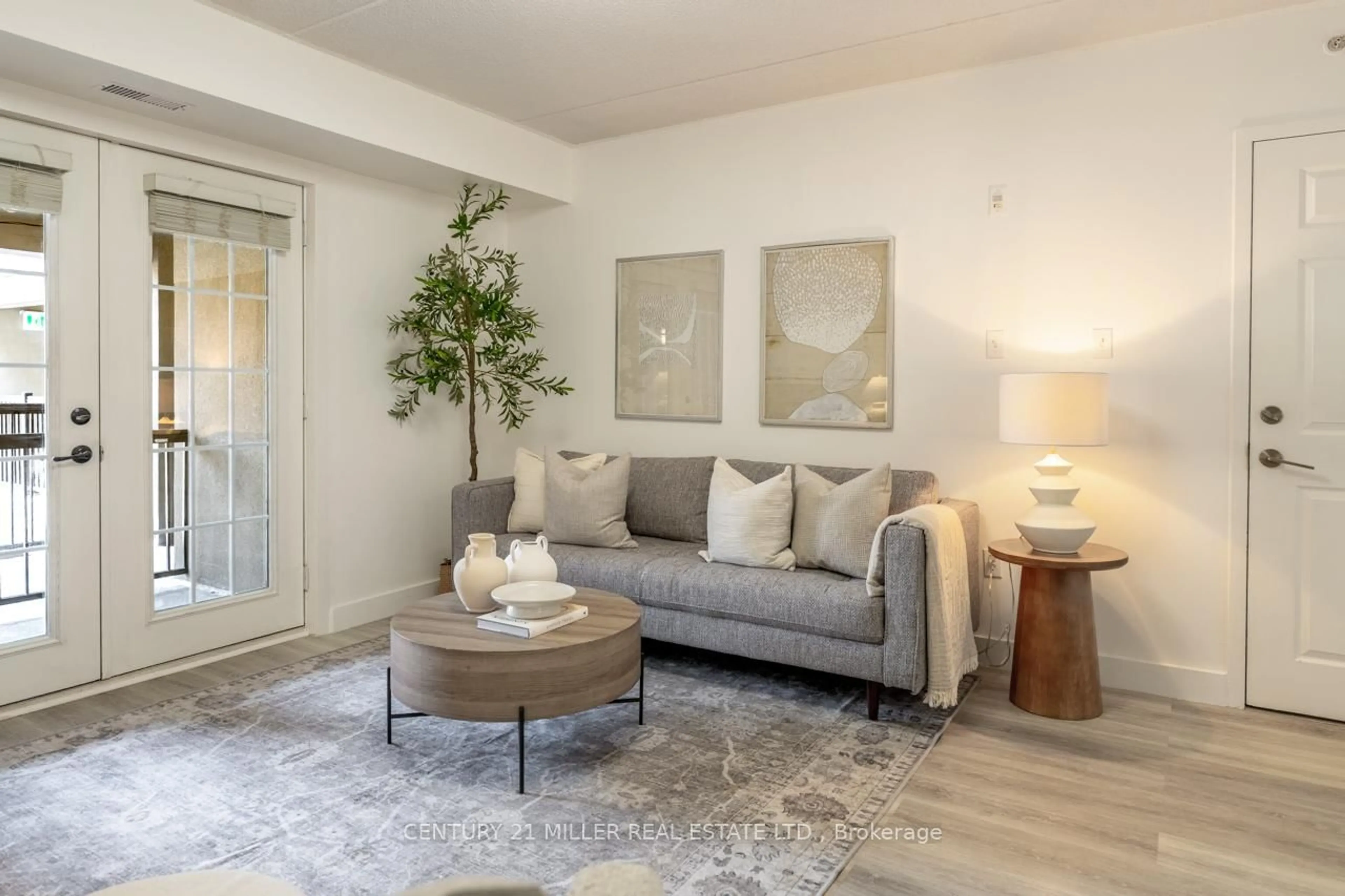 Living room with furniture, unknown for 1487 Maple Ave #208, Milton Ontario L9T 0B7