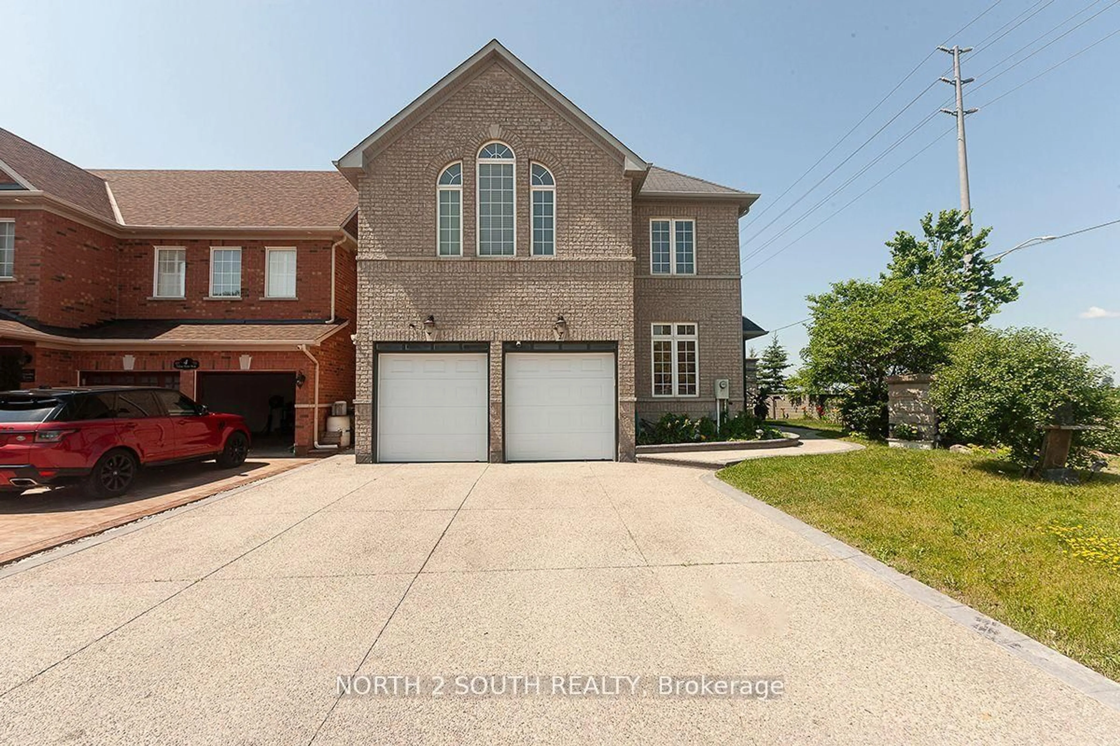 Home with brick exterior material, street for 2 Yellow Avens Blvd, Brampton Ontario L6R 0R5