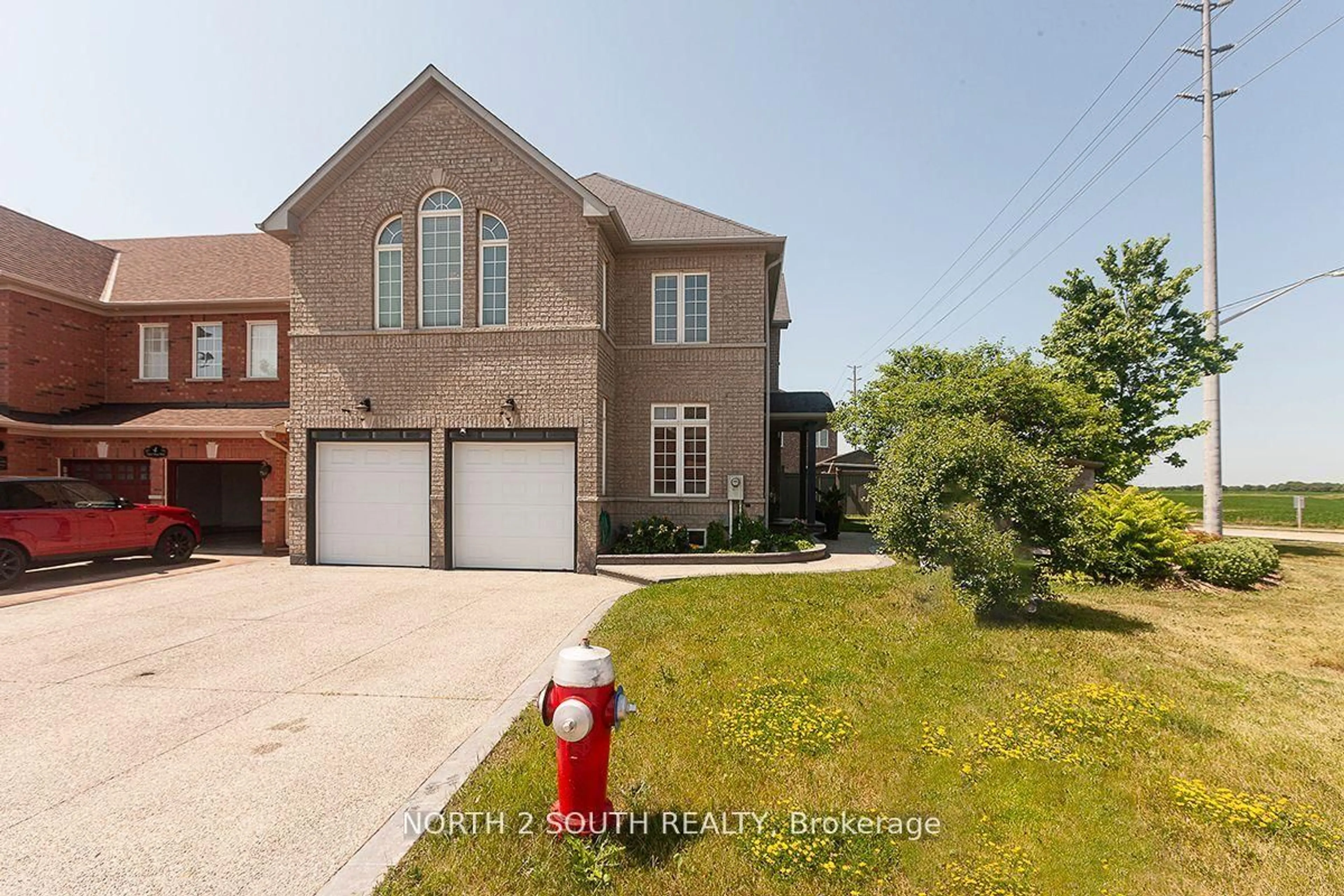 Home with brick exterior material, street for 2 Yellow Avens Blvd, Brampton Ontario L6R 0R5