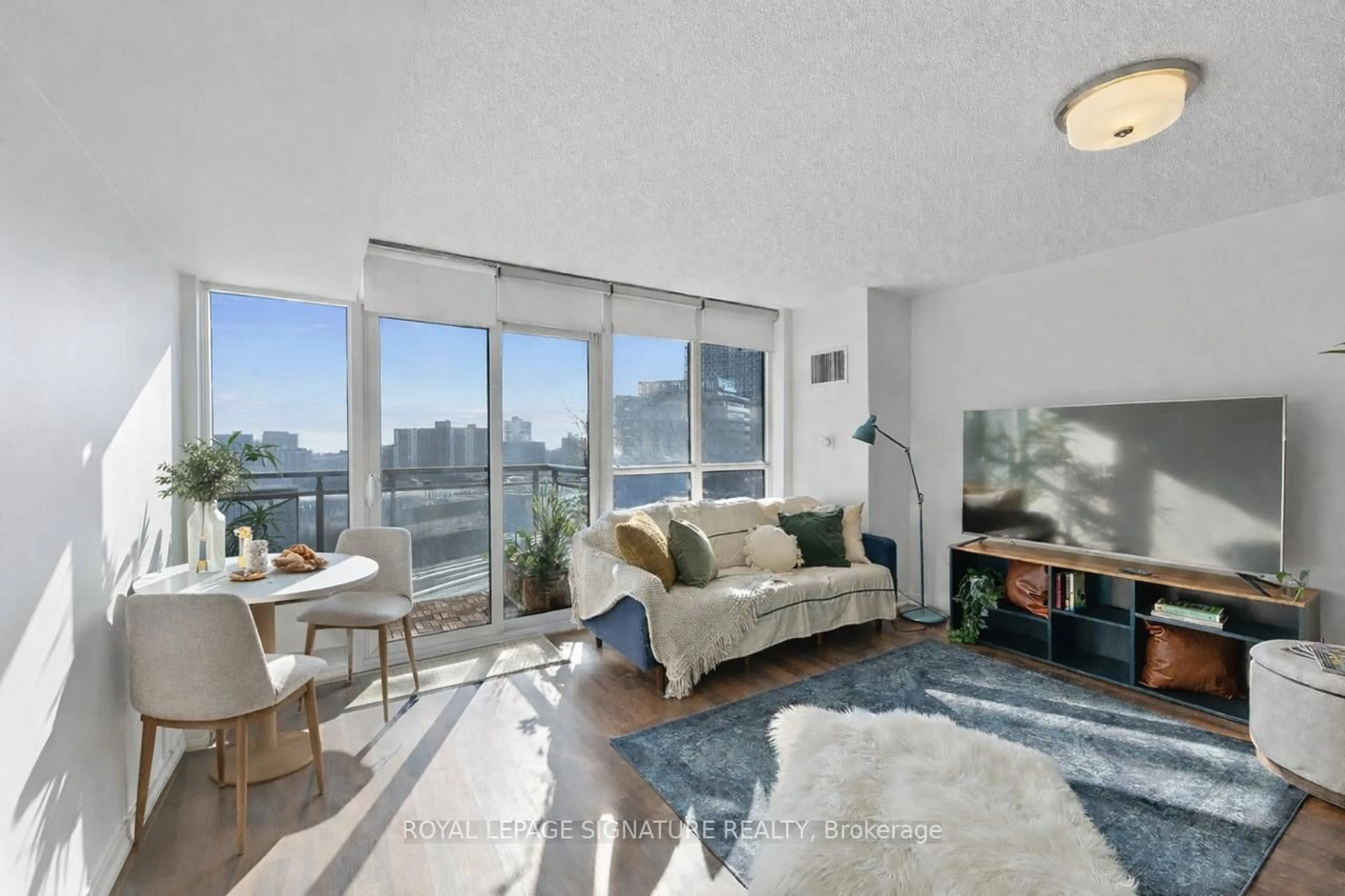 Living room with furniture, unknown for 38 Joe Shuster Way #1013, Toronto Ontario M6K 0A5