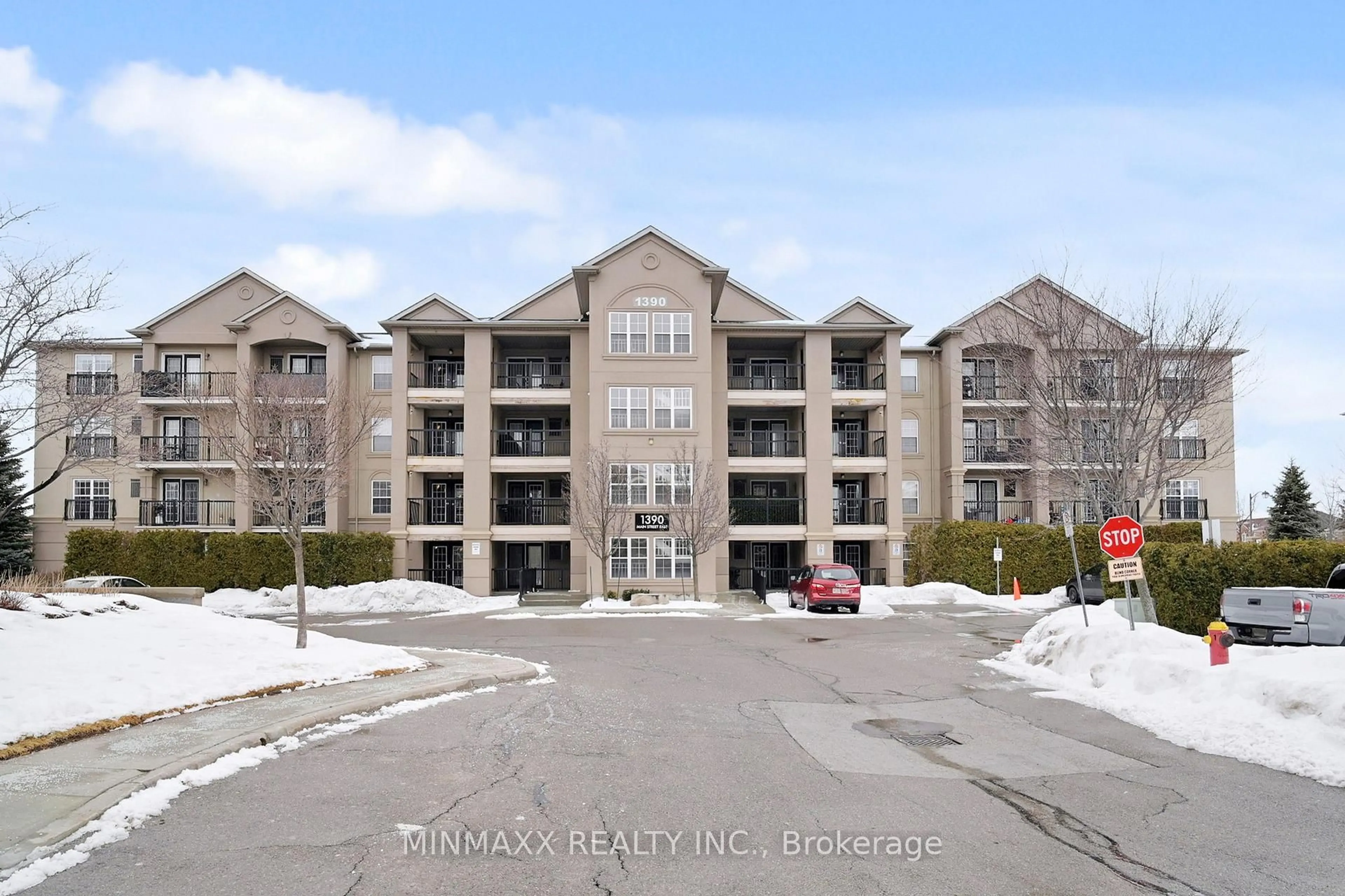 A pic from outside/outdoor area/front of a property/back of a property/a pic from drone, unknown for 1390 Main St #211, Milton Ontario L9T 7S9