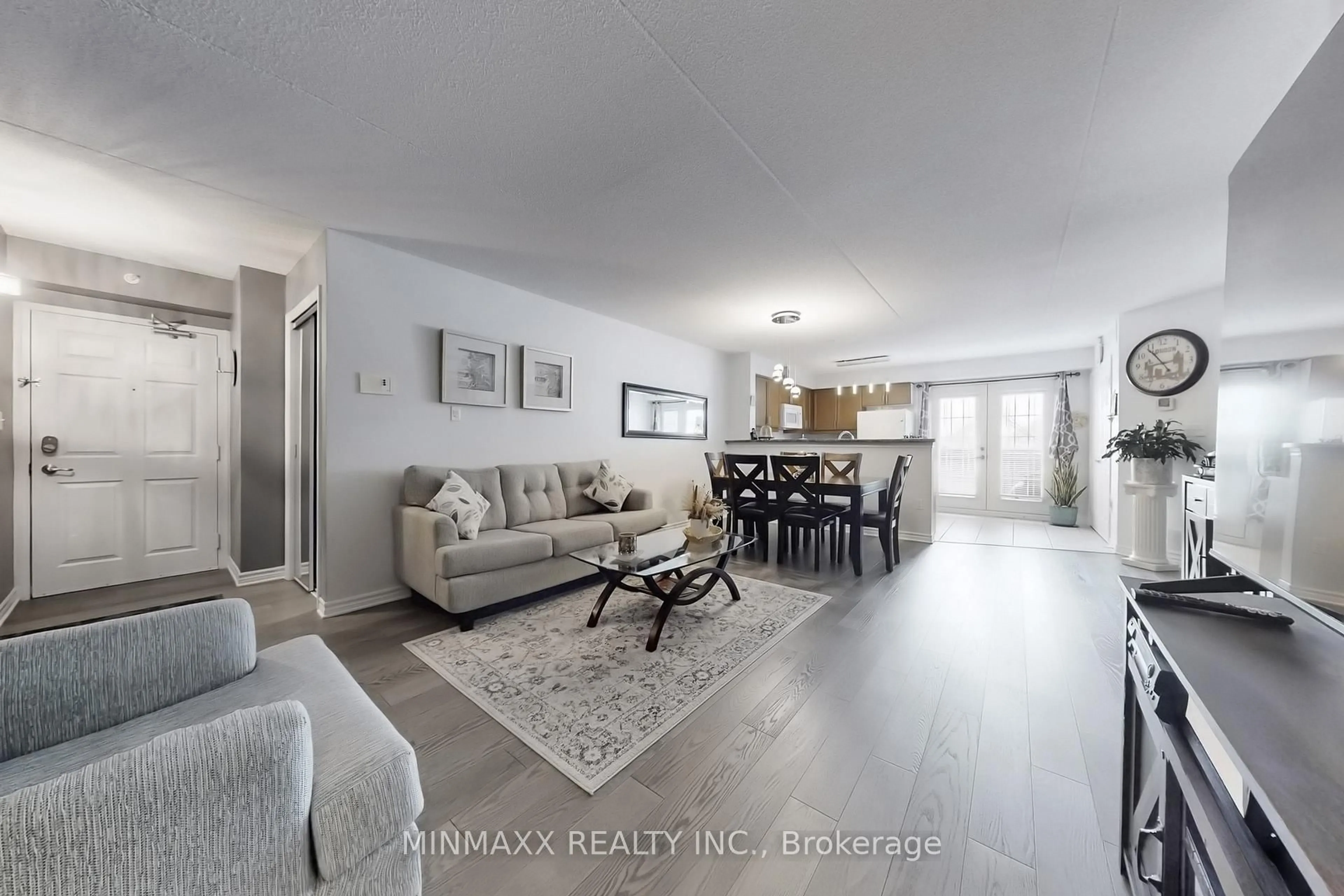 Living room with furniture, unknown for 1390 Main St #211, Milton Ontario L9T 7S9