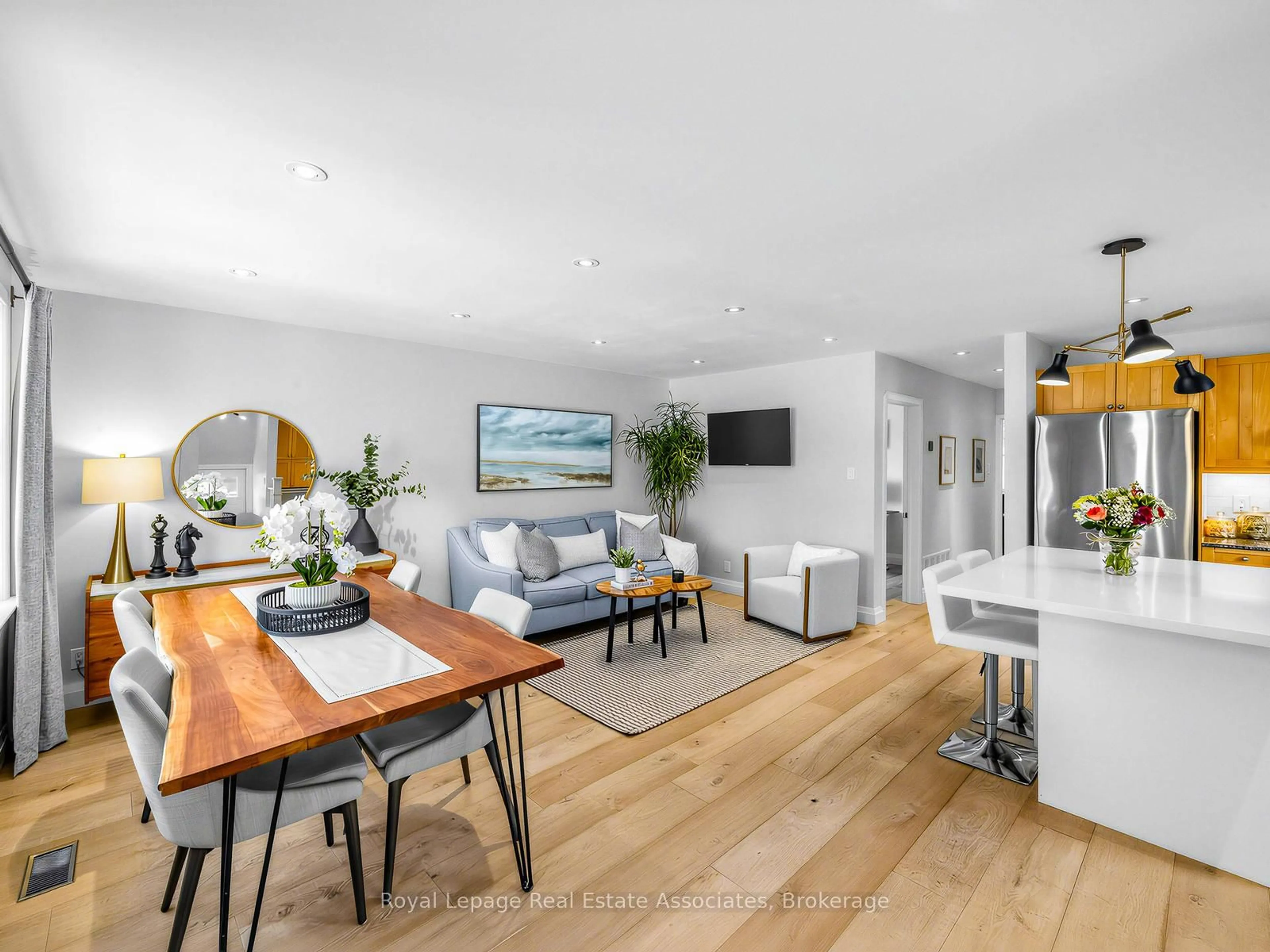 Living room with furniture, wood/laminate floor for 96 Angelene St, Mississauga Ontario L5G 1X2