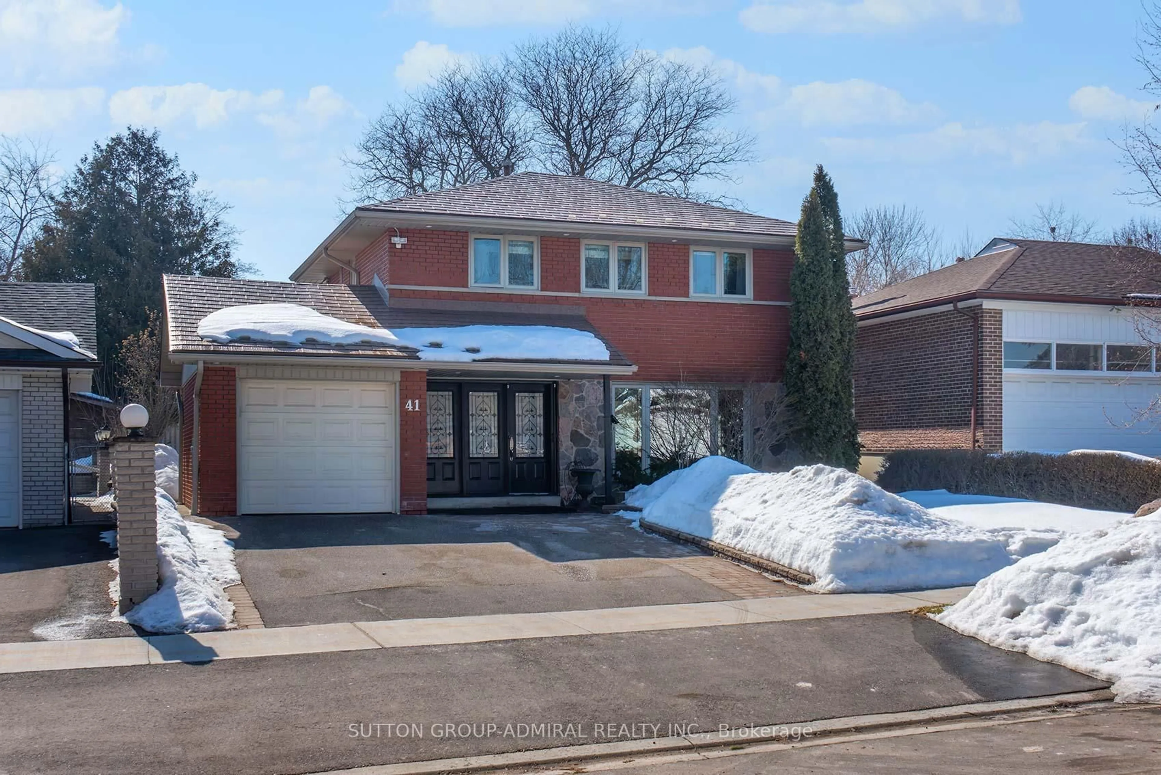 Home with brick exterior material, street for 41 Hamptonbrook Dr, Toronto Ontario M9P 1A2