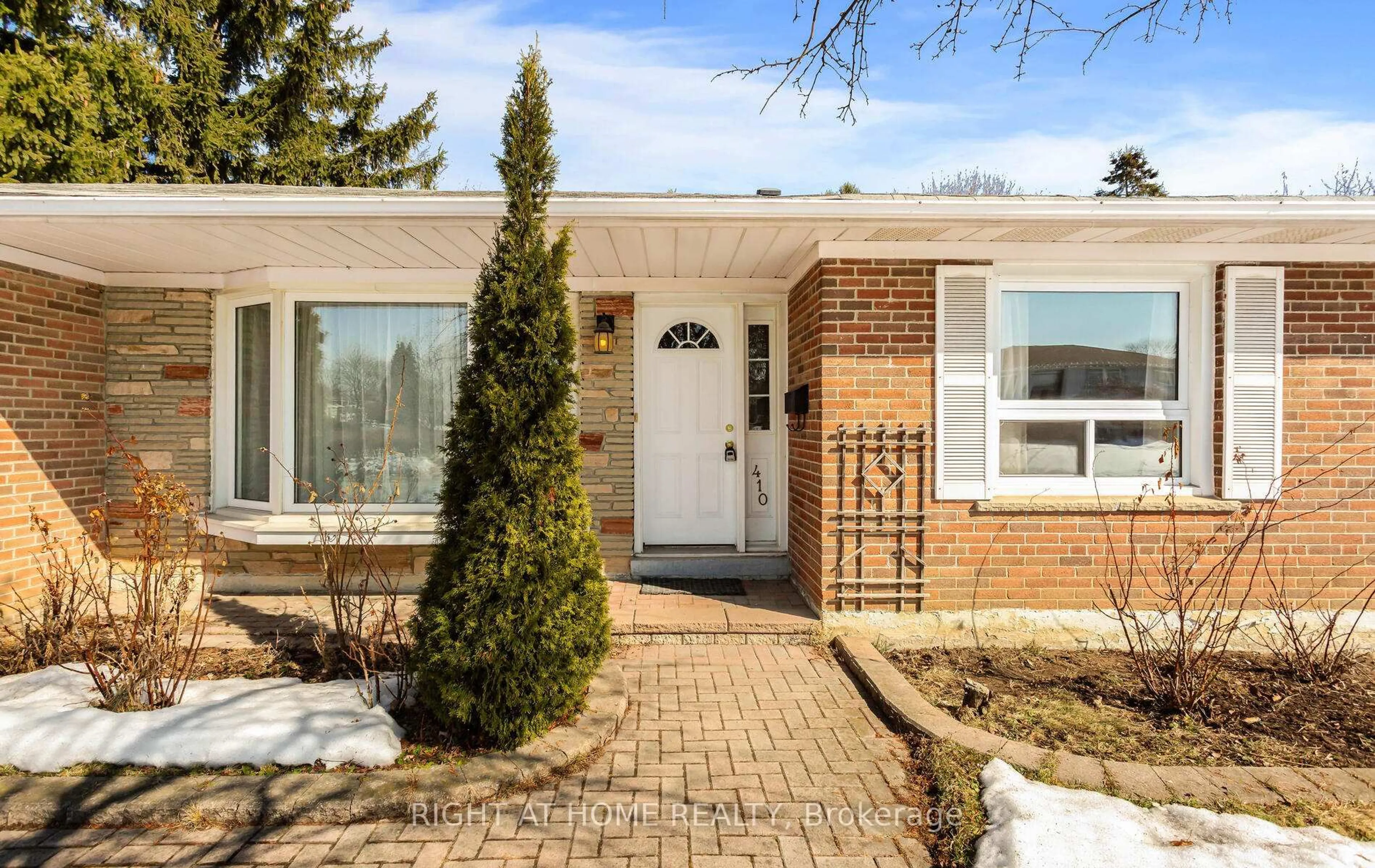 Home with brick exterior material, street for 410 Bartley Bull Pkwy, Brampton Ontario L6W 2L8