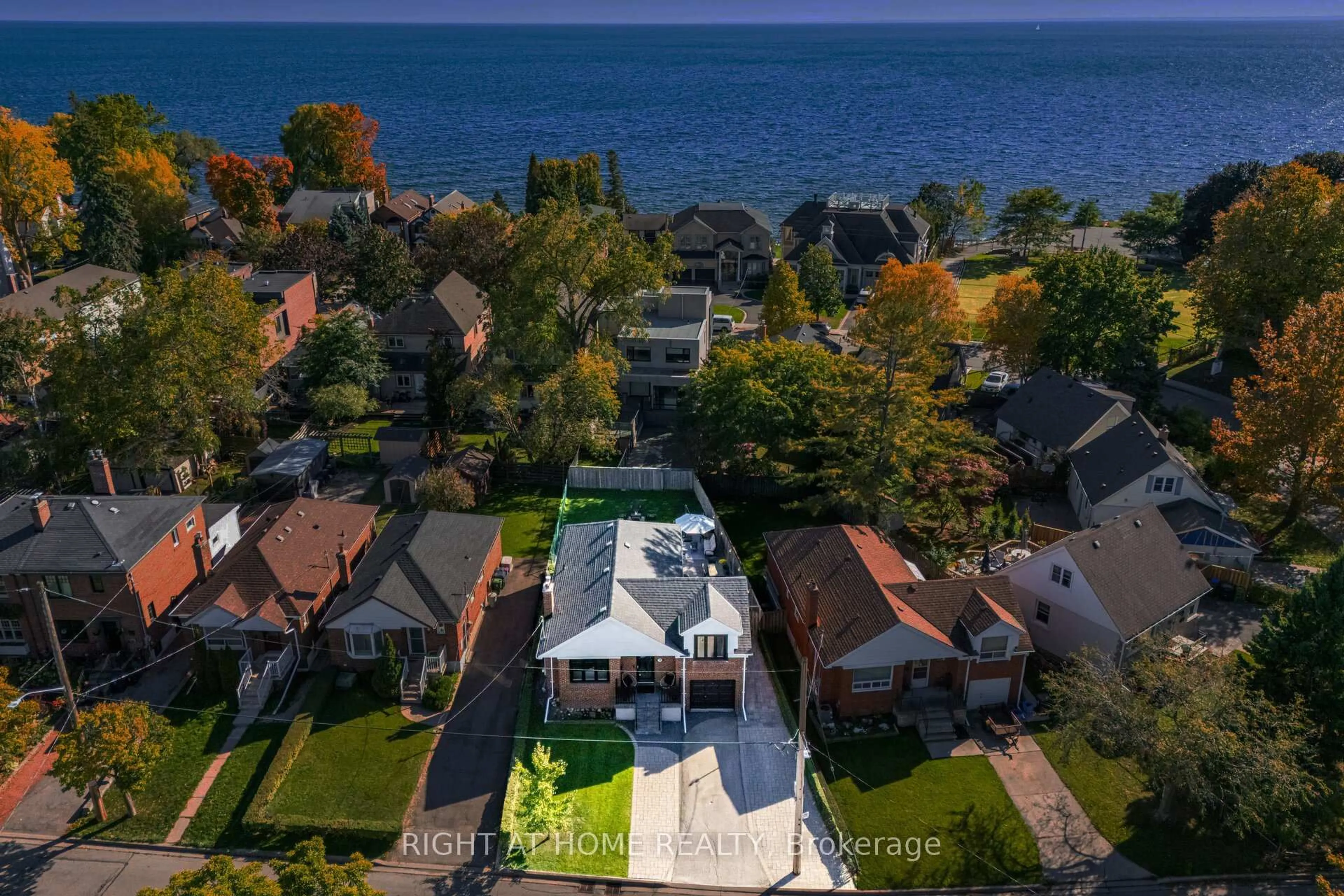 A pic from outside/outdoor area/front of a property/back of a property/a pic from drone, water/lake/river/ocean view for 75 Emerald Cres, Toronto Ontario M8V 2B5