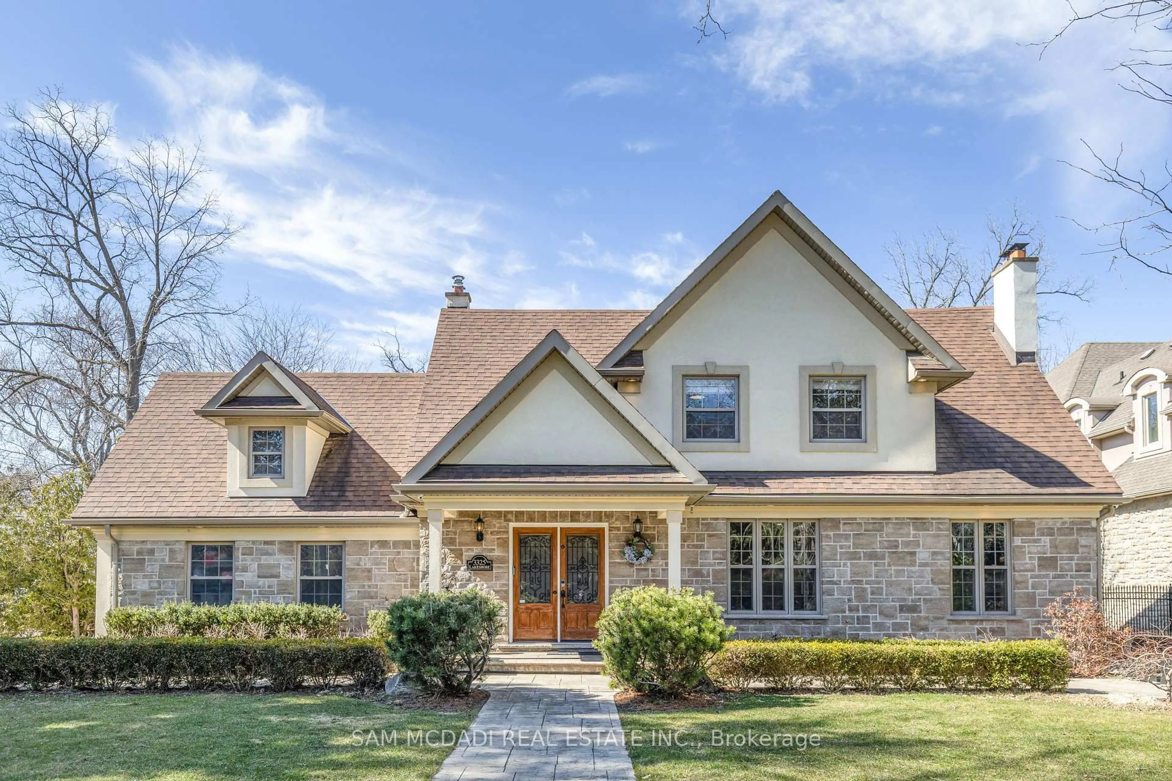 Home with brick exterior material, street for 3325 Lakeshore Rd, Burlington Ontario L7N 1B1