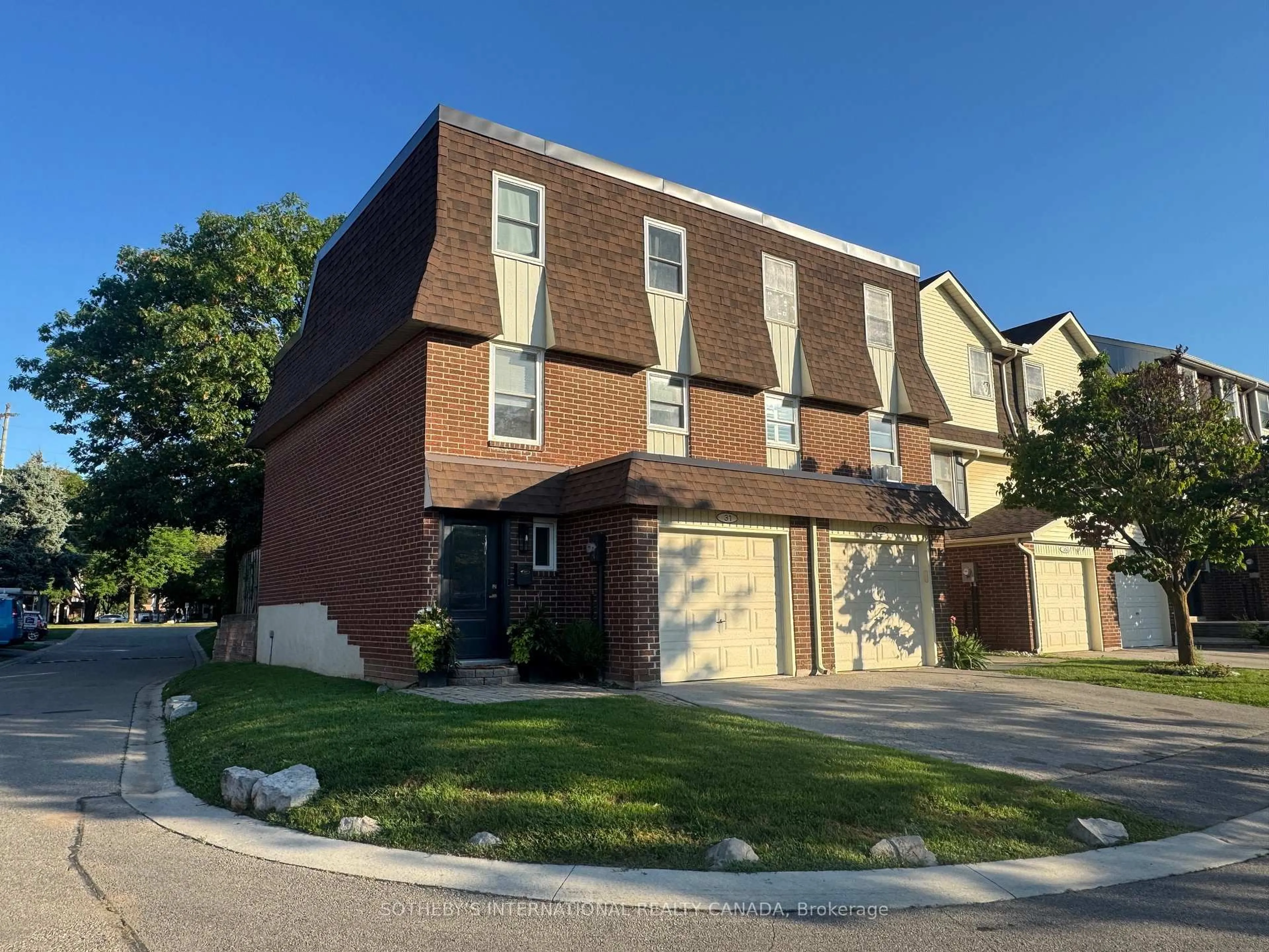 Home with brick exterior material, street for 30 Heslop Rd #31, Milton Ontario L9T 1B3