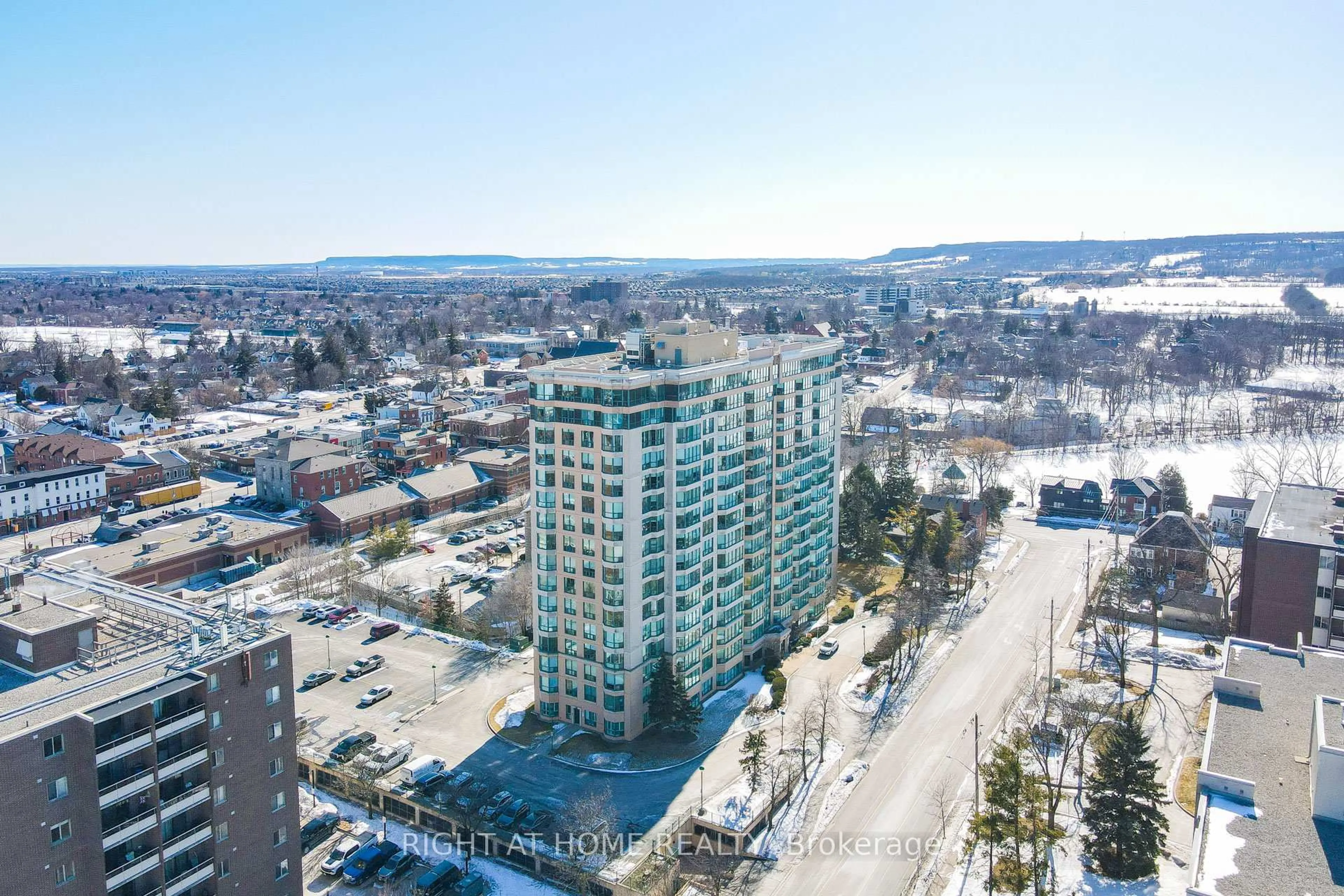 A pic from outside/outdoor area/front of a property/back of a property/a pic from drone, city buildings view from balcony for 100 Millside Dr #210, Milton Ontario L9T 5E2