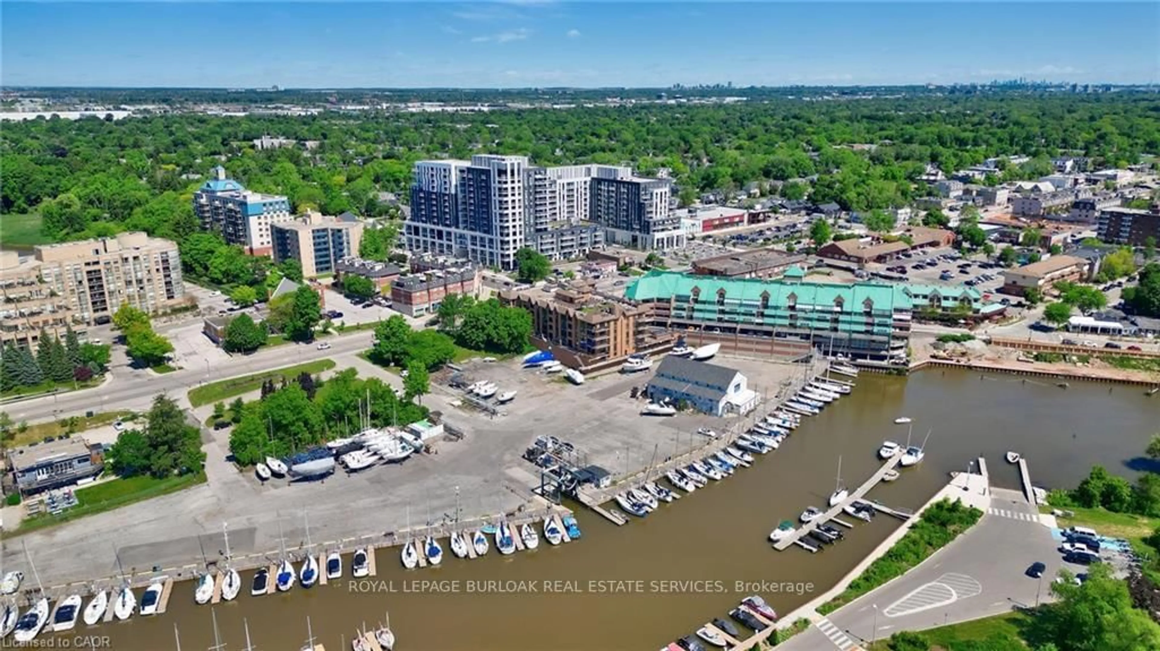 A pic from outside/outdoor area/front of a property/back of a property/a pic from drone, water/lake/river/ocean view for 102 Bronte Rd #303, Oakville Ontario L6L 6J5