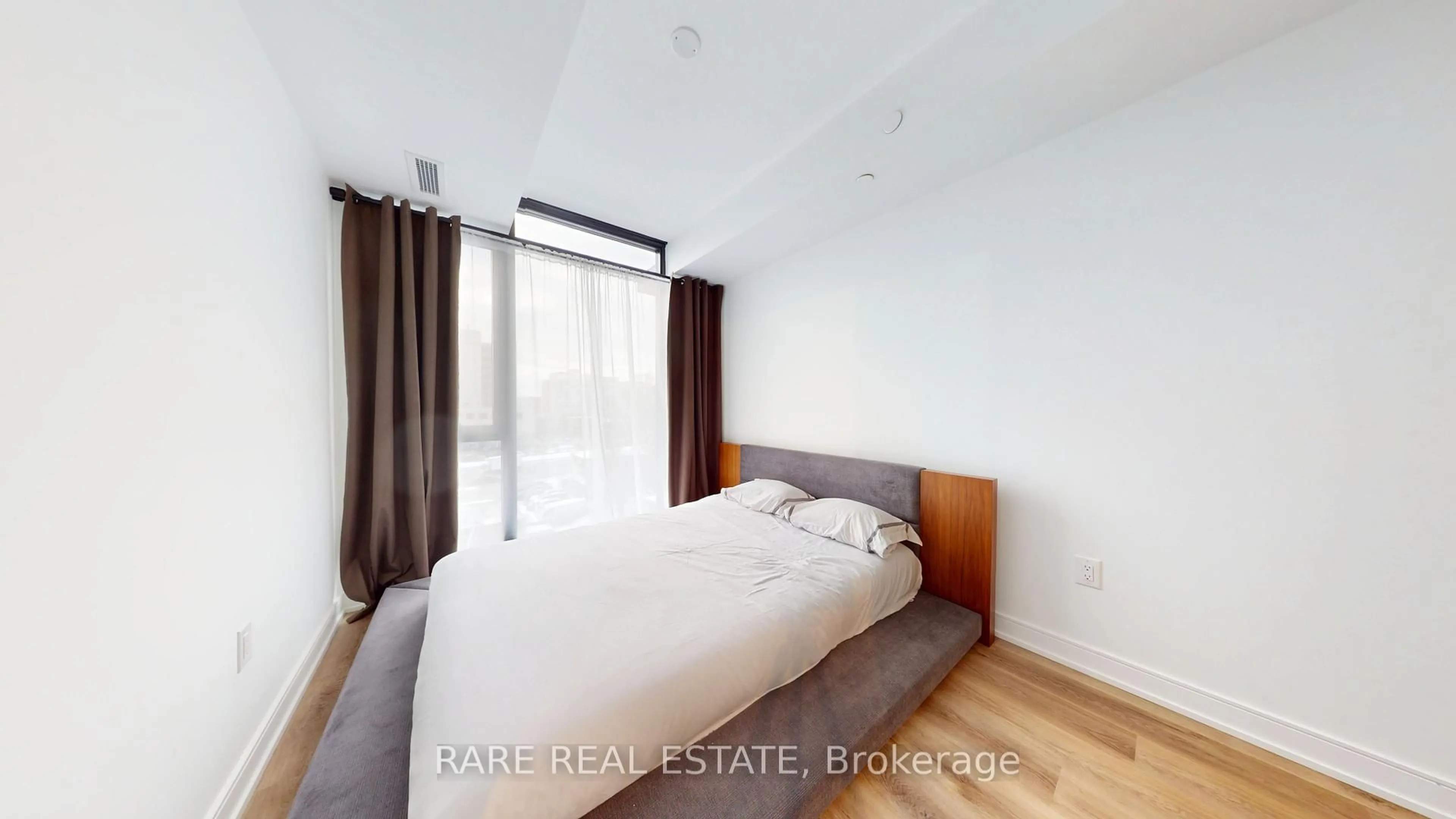 Bedroom with bed, wood/laminate floor for 3009 Novar Rd #412, Mississauga Ontario L5B 0P9