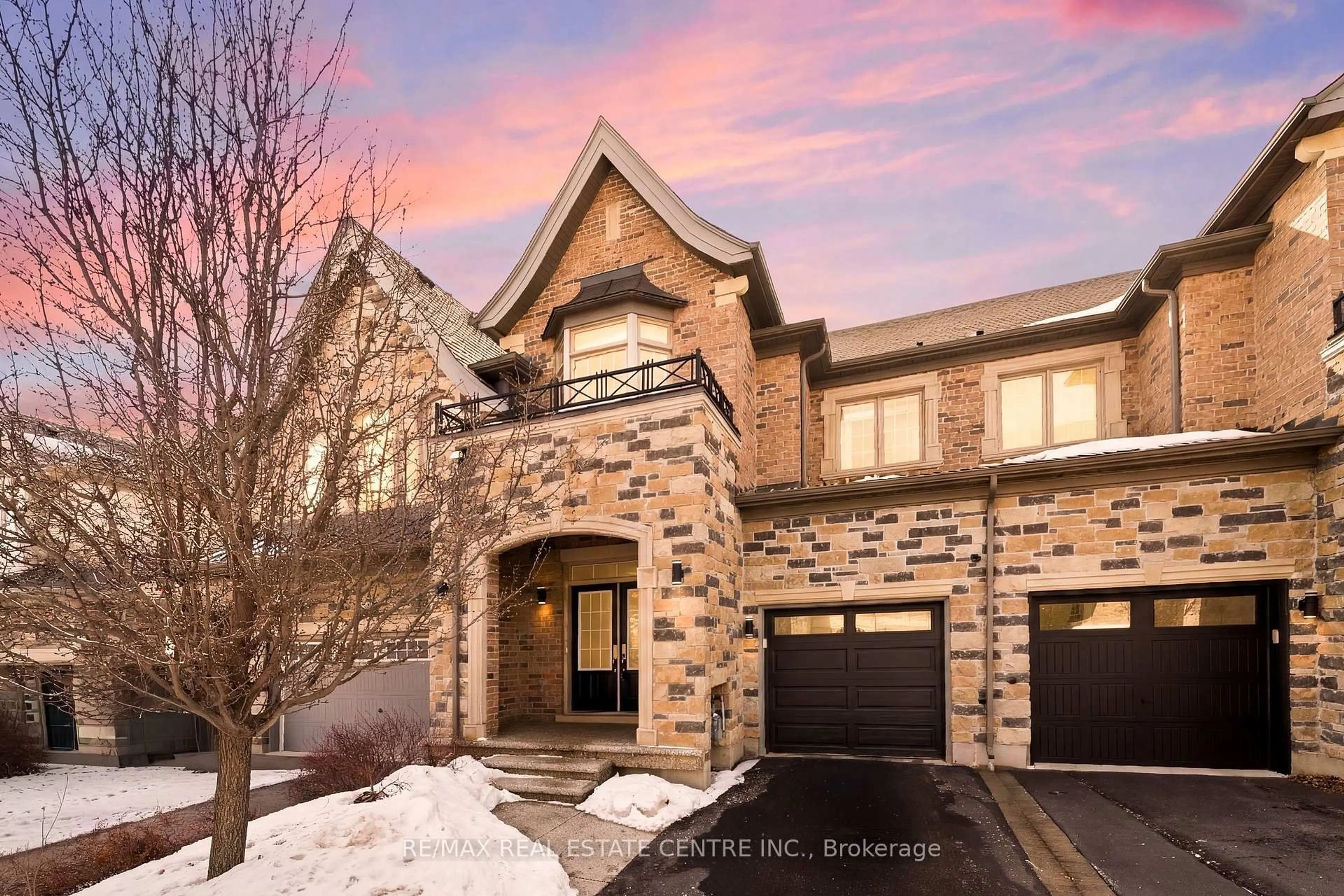 Home with brick exterior material, street for 2466 Village Common, Oakville Ontario L6M 0S2