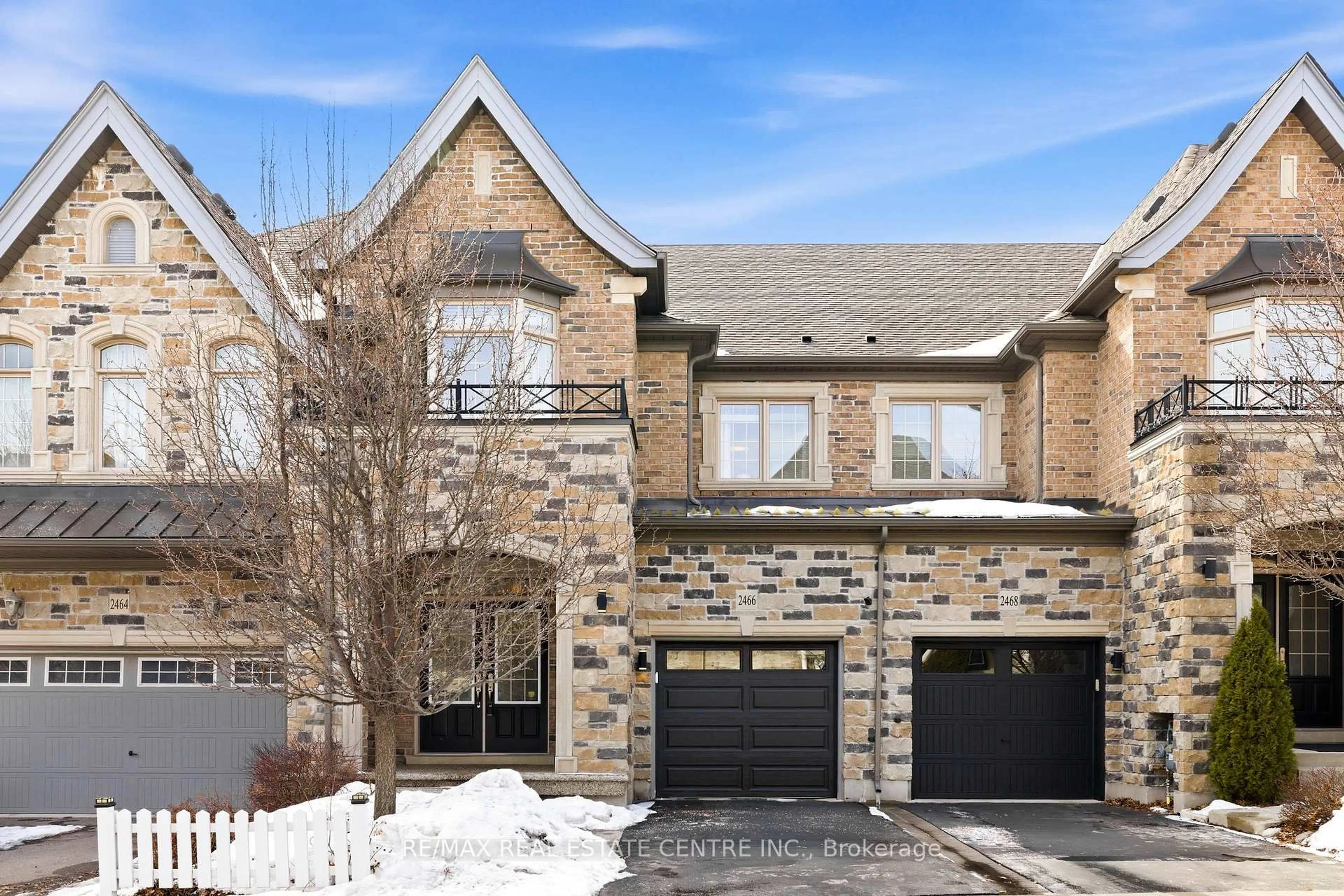 Home with brick exterior material, street for 2466 Village Common, Oakville Ontario L6M 0S2