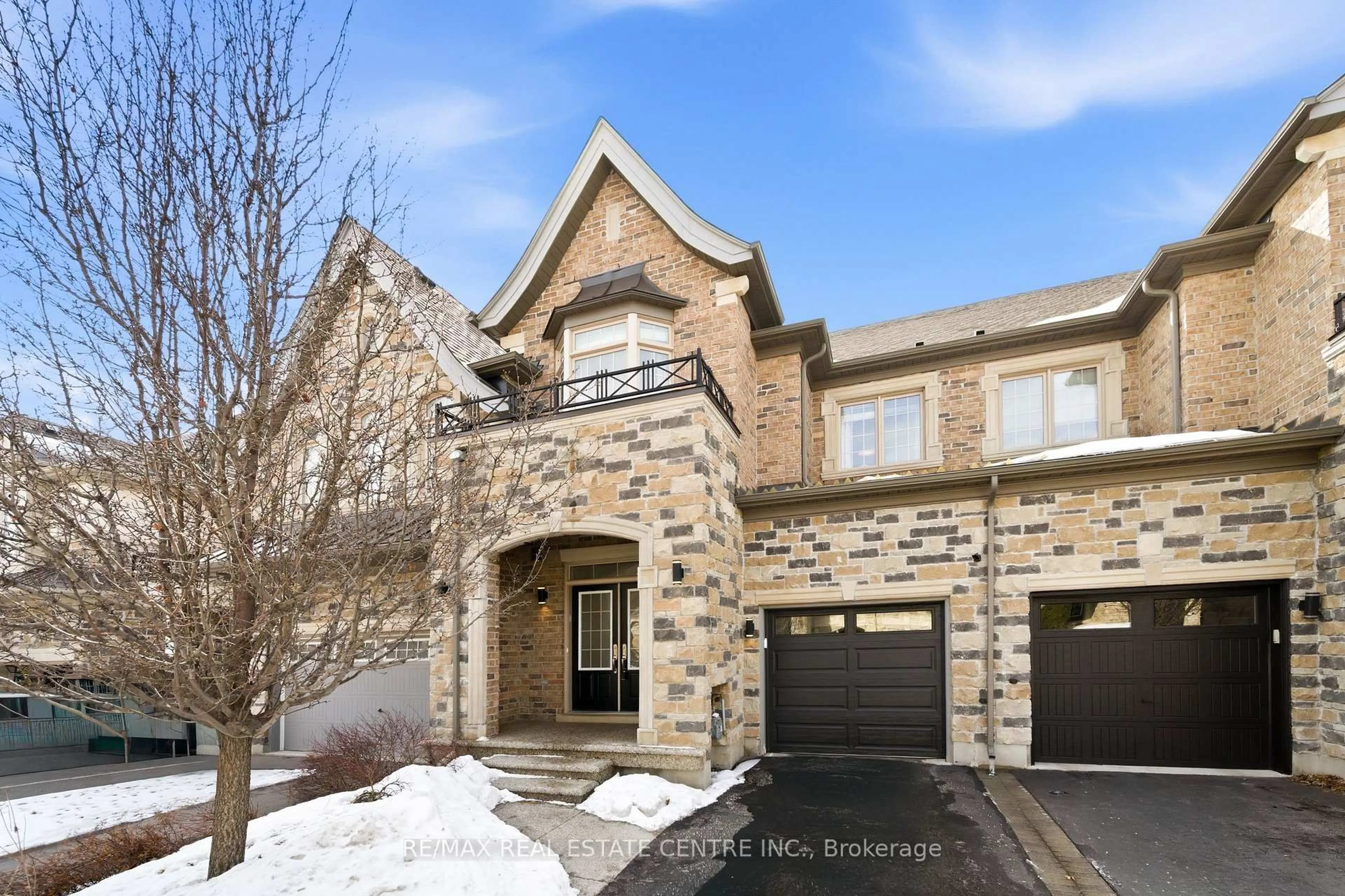 Home with brick exterior material, street for 2466 Village Common, Oakville Ontario L6M 0S2