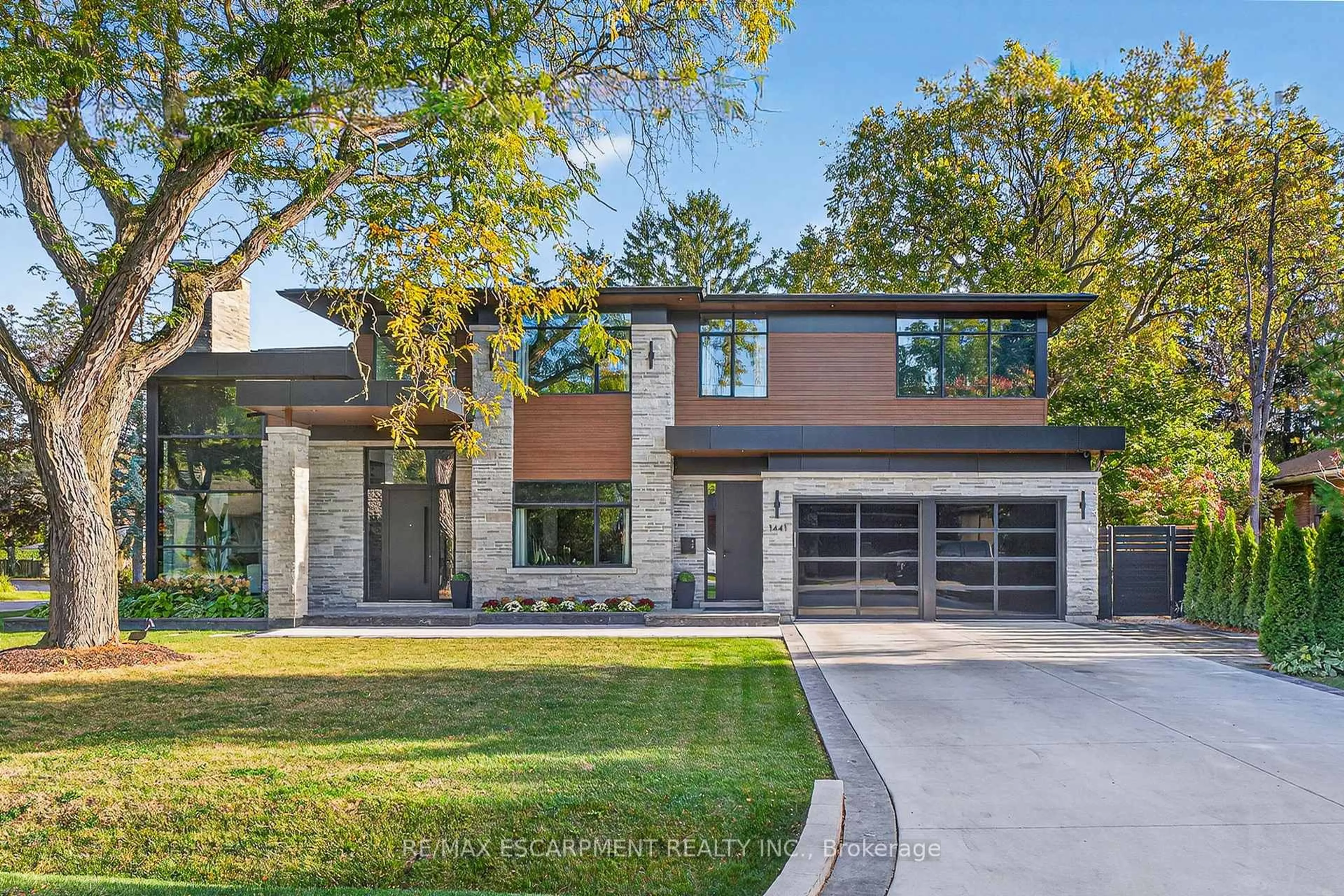 Home with brick exterior material, street for 1441 Lochlin Tr, Mississauga Ontario L5G 3V5