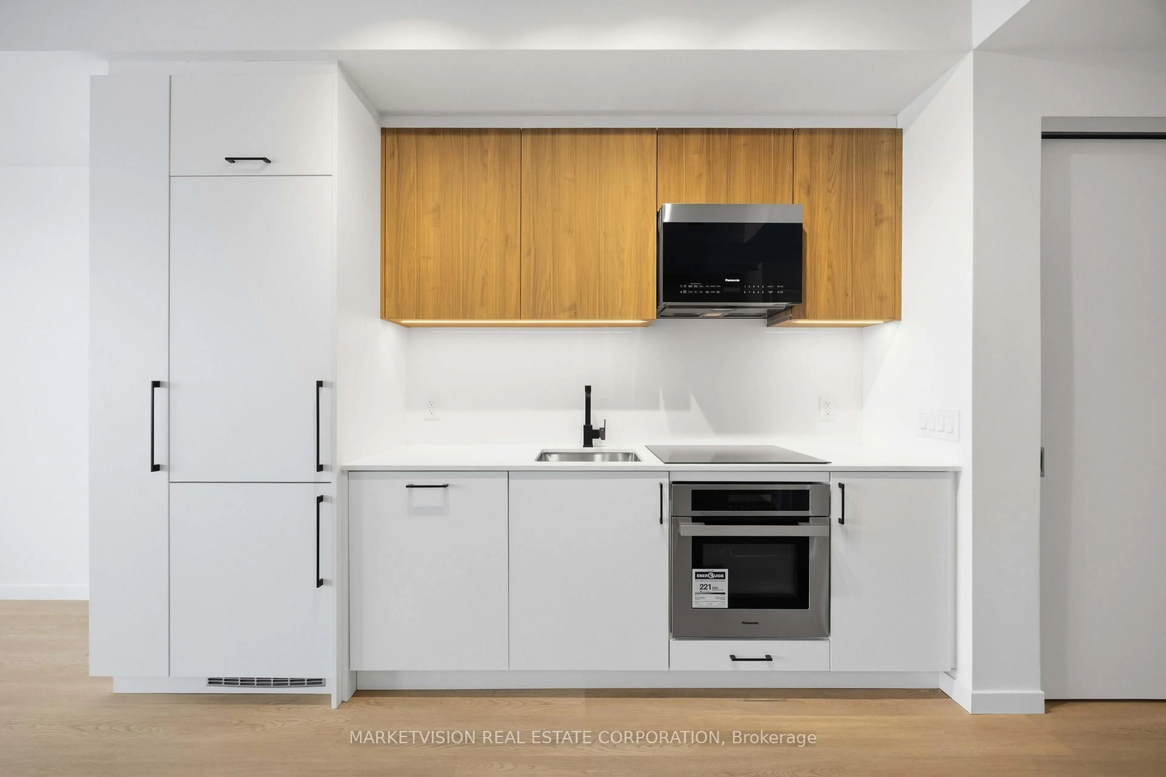 Standard kitchen, wood/laminate floor for 689 The Queensway #318, Toronto Ontario M8Y 1L1