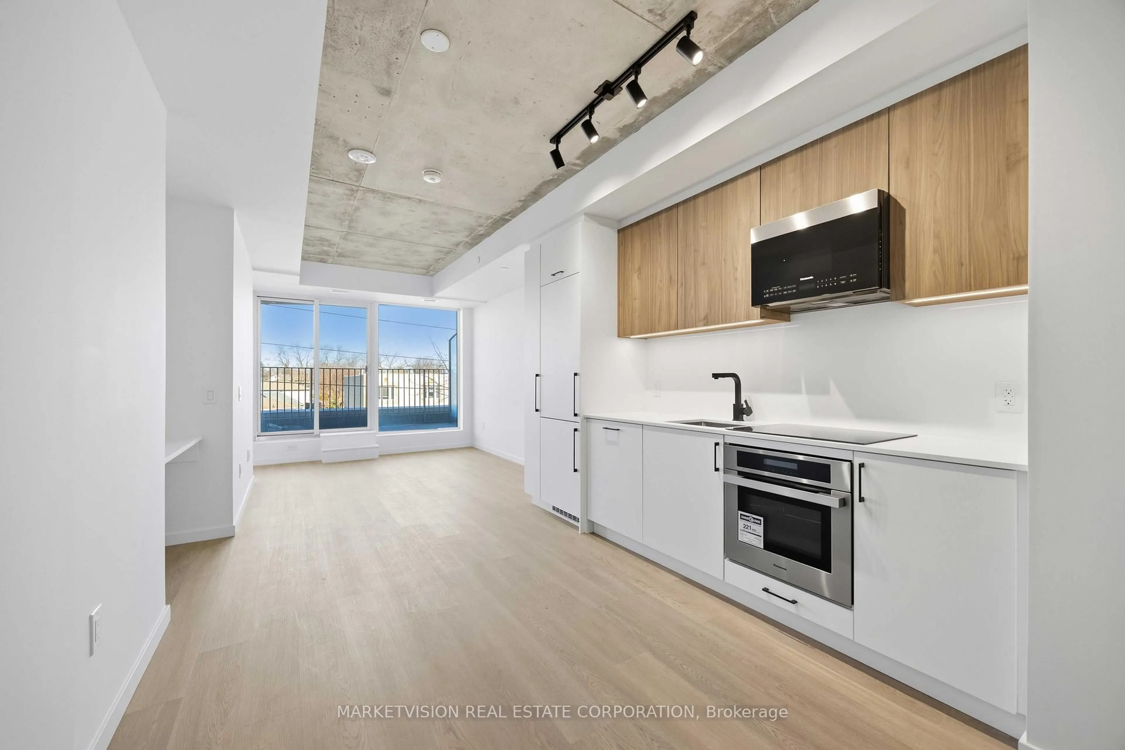 Open concept kitchen, unknown for 689 The Queensway #318, Toronto Ontario M8Y 1L1