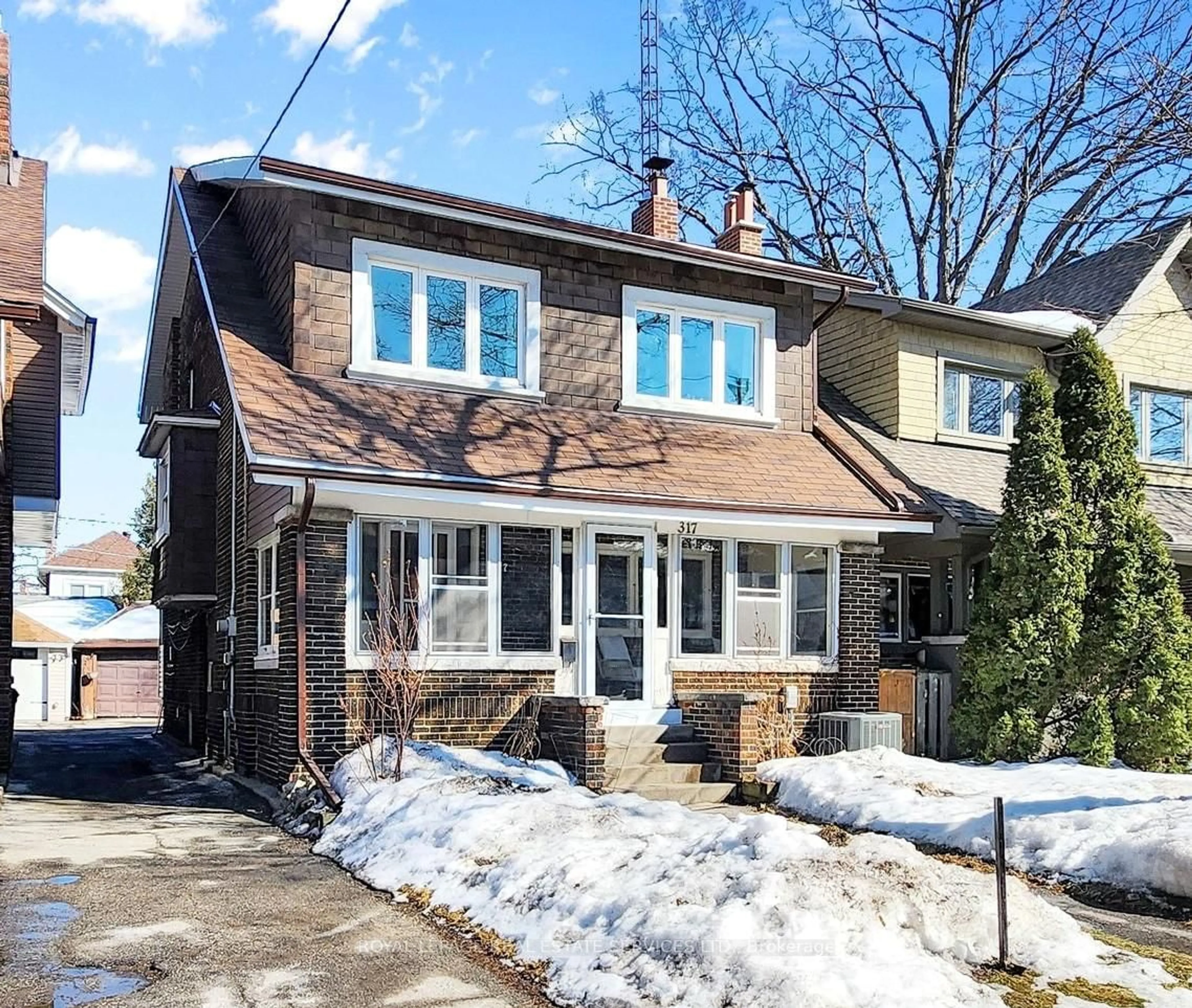 Home with brick exterior material, street for 317 Runnymede Rd, Toronto Ontario M6S 2Y5