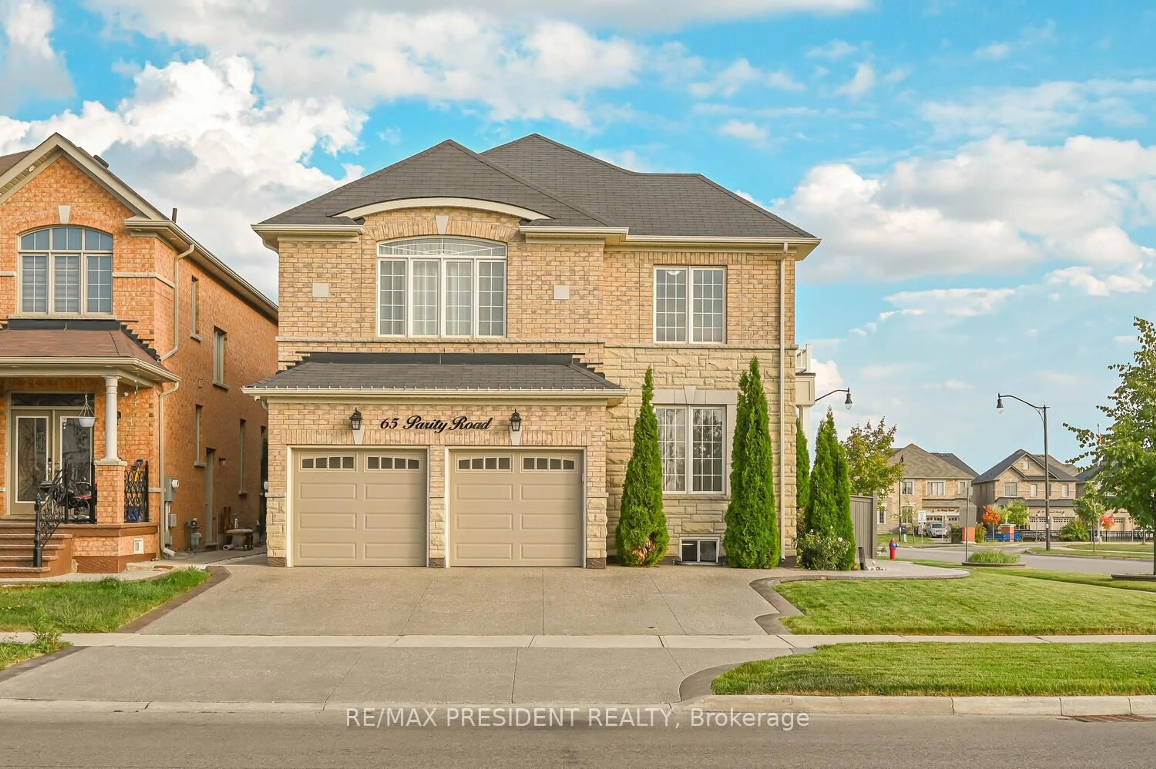 Home with brick exterior material, street for 65 Parity Rd, Brampton Ontario L6X 5M8