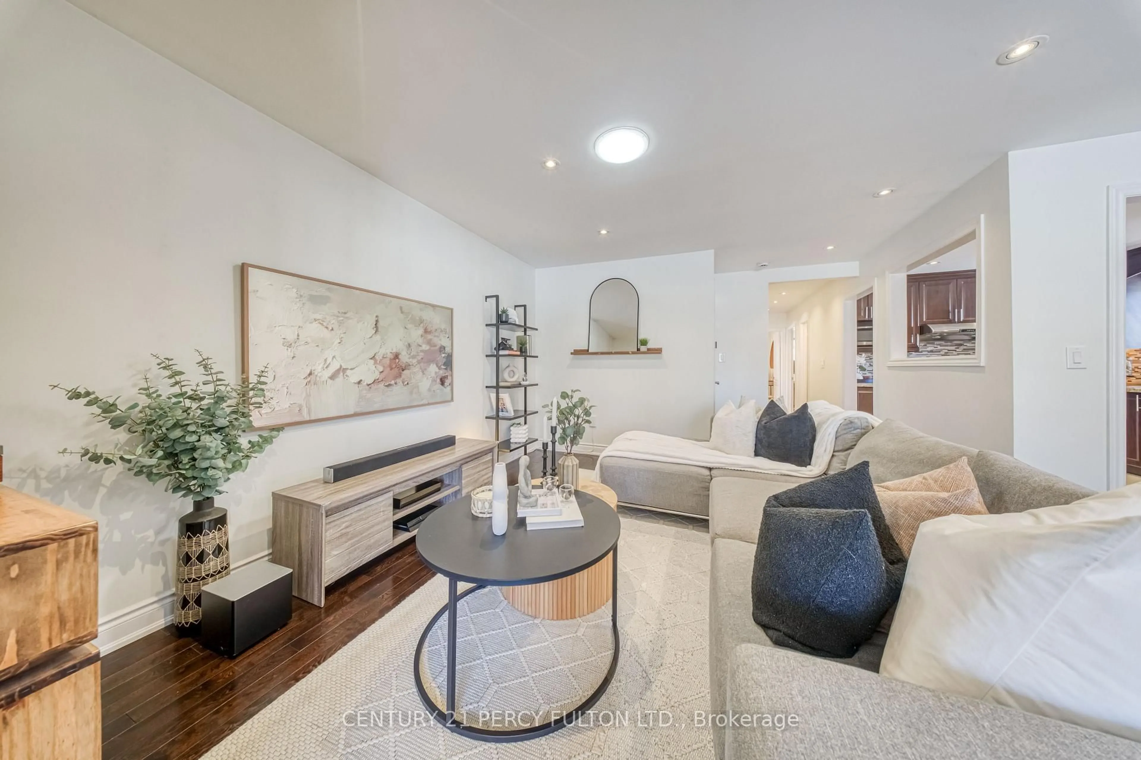 Living room with furniture, unknown for 23 Wellesworth Dr, Toronto Ontario M9C 4P5