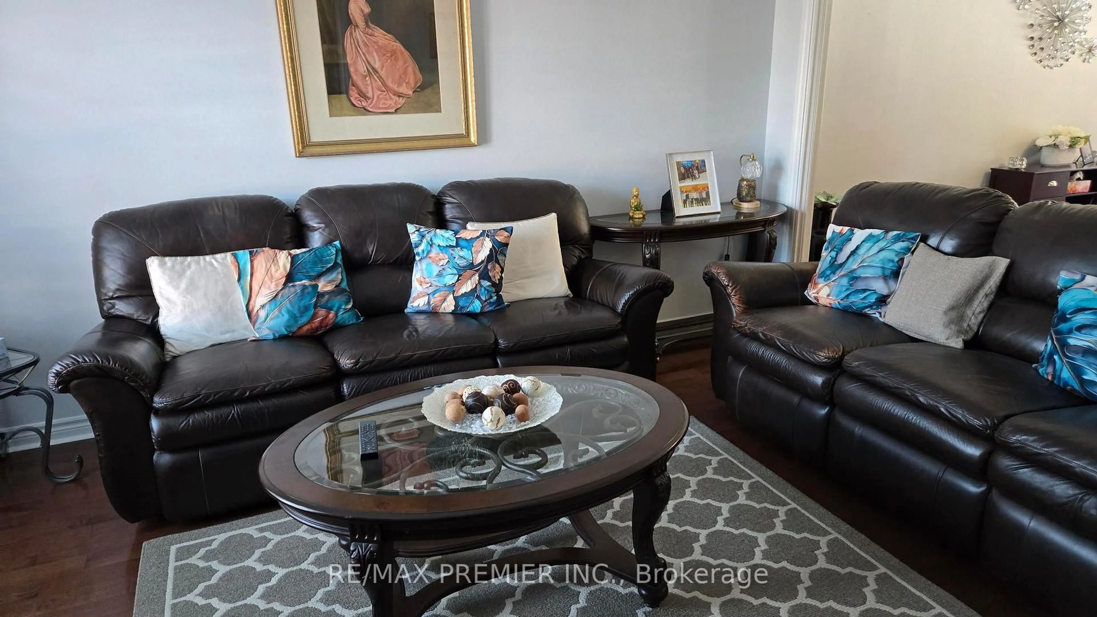 Living room with furniture, wood/laminate floor for 54 Fountainbridge Dr, Caledon Ontario L7E 1N4