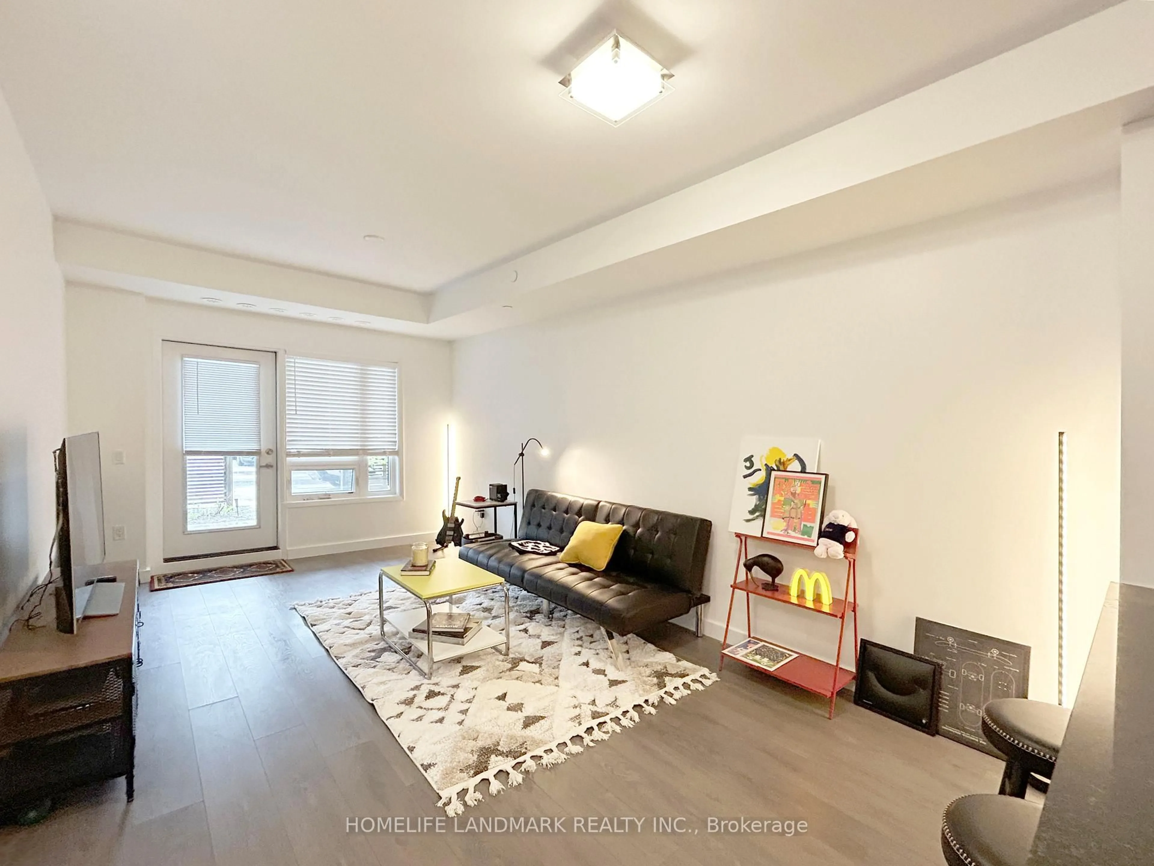 Living room with furniture, unknown for 5005 Harvard Rd #101, Mississauga Ontario L5M 0W5