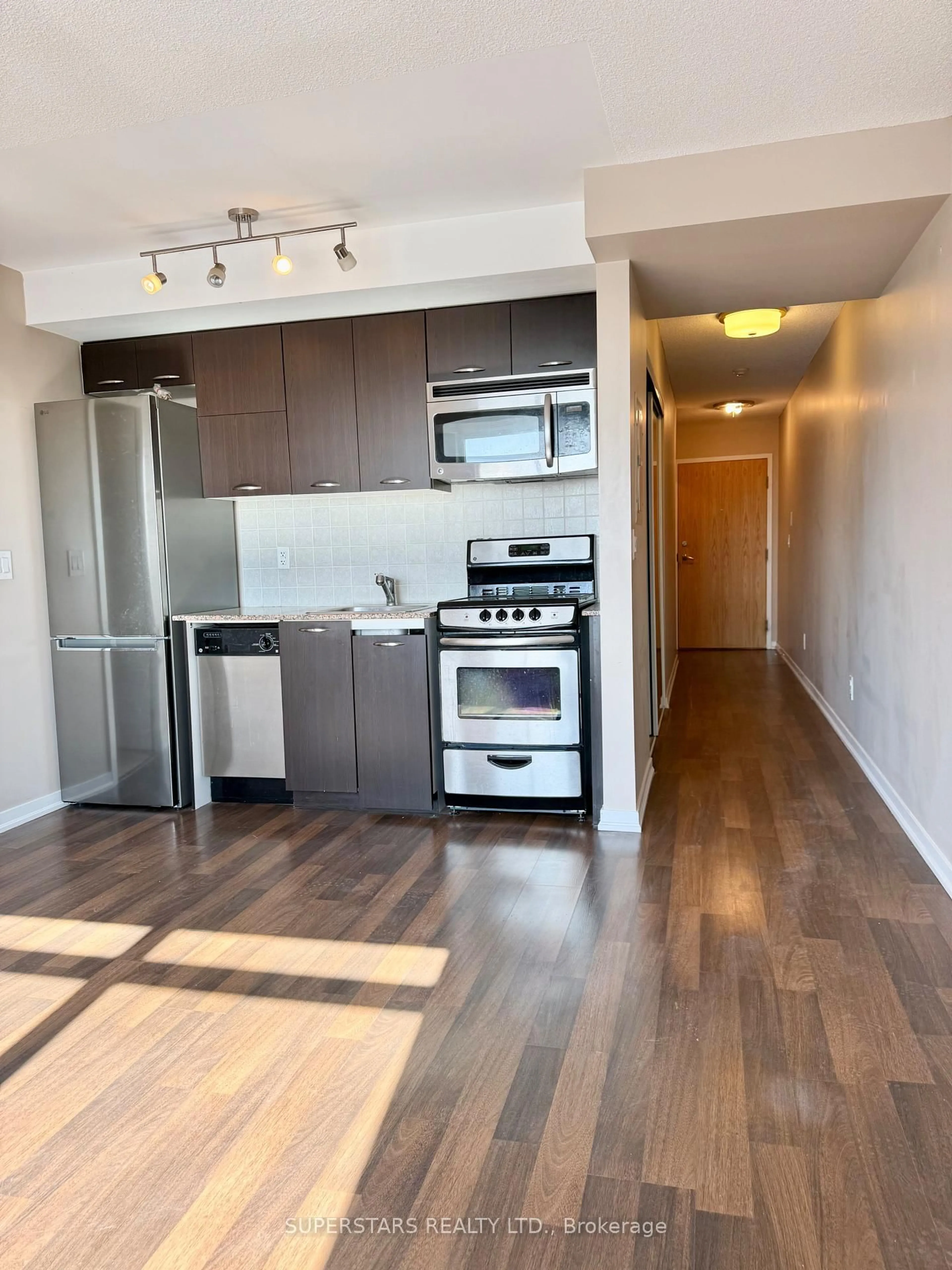 Standard kitchen, wood/laminate floor for 38 Joe Shuster Way #1416, Toronto Ontario M6K 0A5
