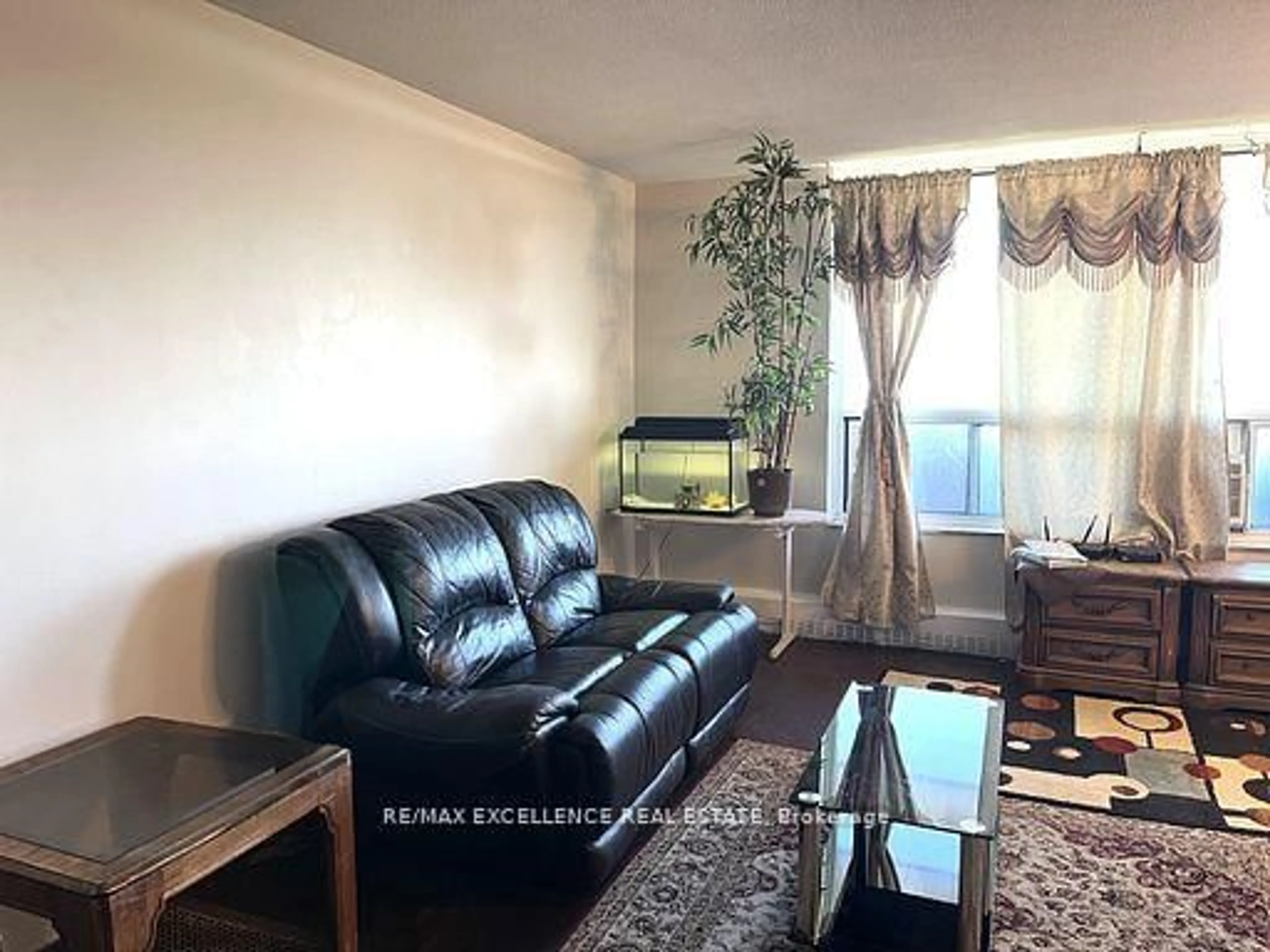Living room with furniture, unknown for 3390 Weston Rd #2105, Toronto Ontario M9M 2X3