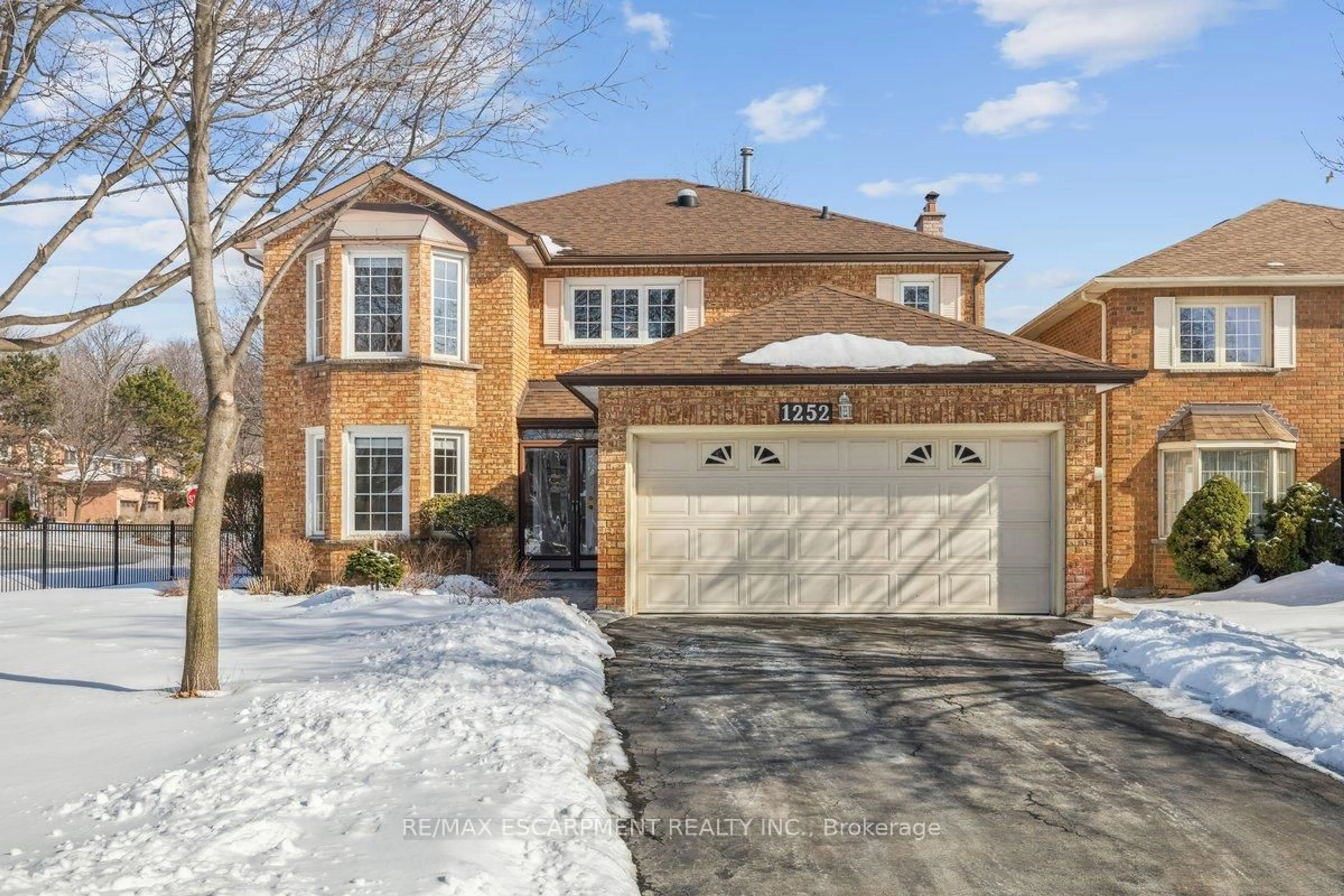 Home with brick exterior material, street for 1252 Sweetbirch Crt, Mississauga Ontario L5C 3R3