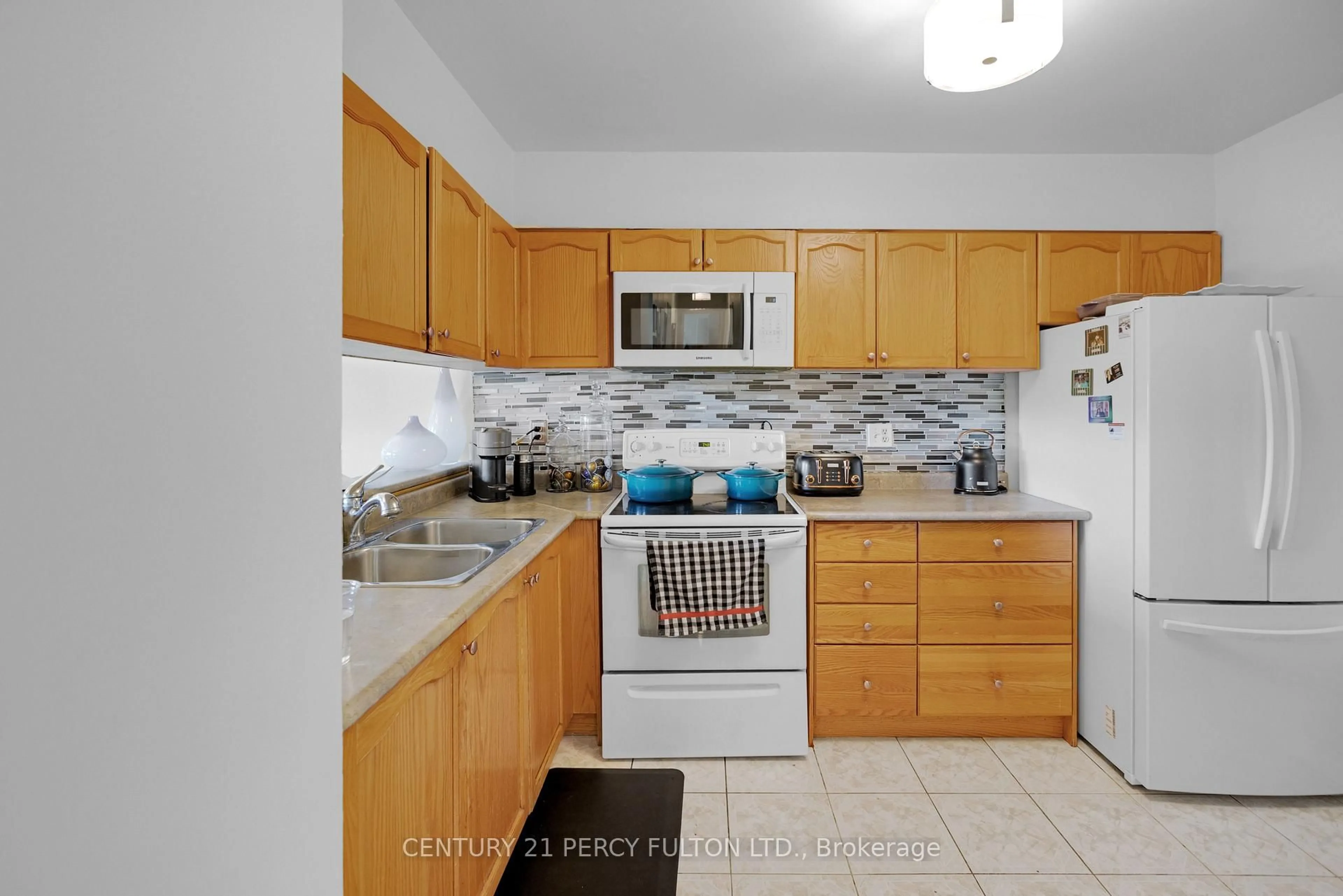 Standard kitchen, ceramic/tile floor for 238 Albion Rd #310, Toronto Ontario M9W 6A7