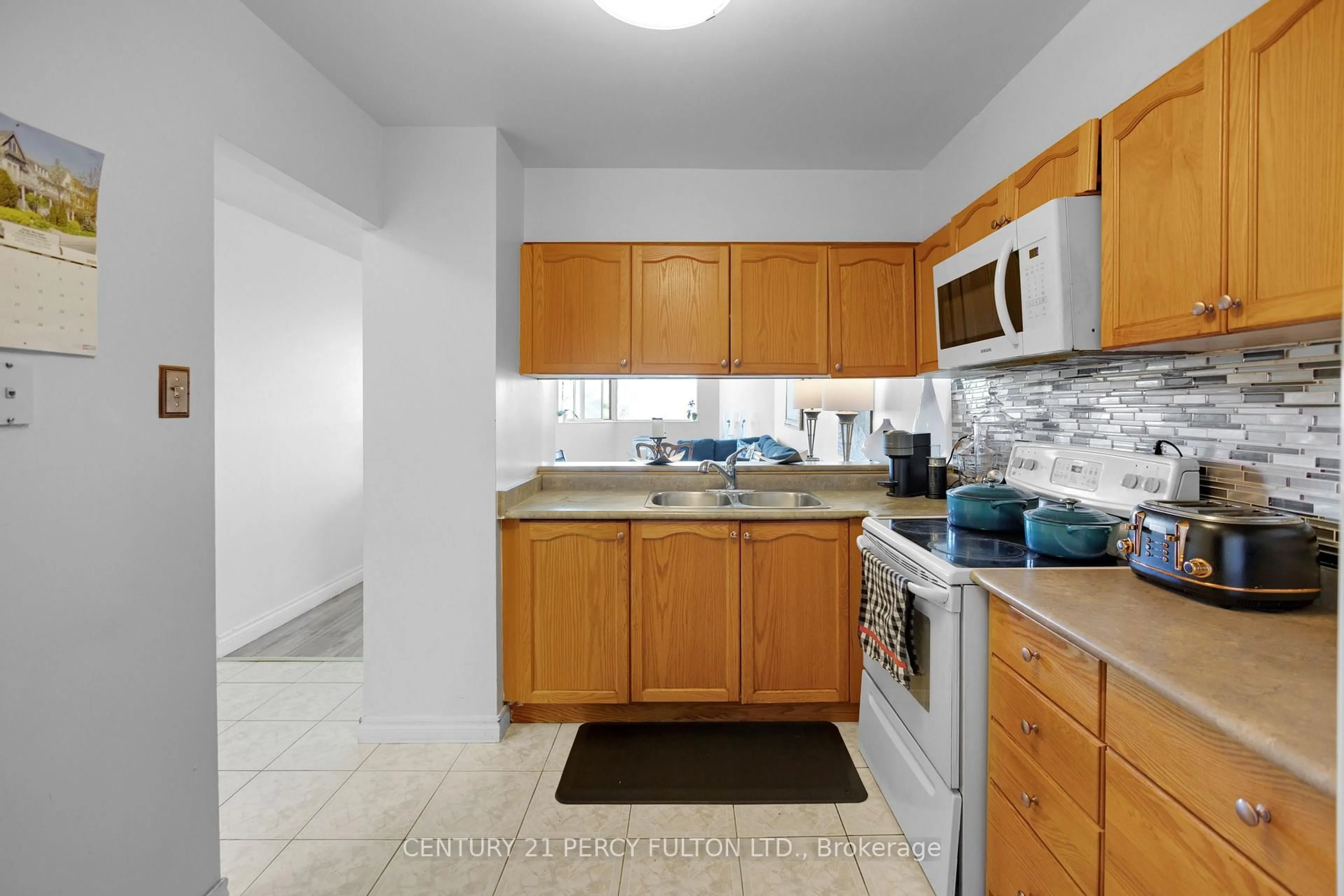 Standard kitchen, ceramic/tile floor for 238 Albion Rd #310, Toronto Ontario M9W 6A7