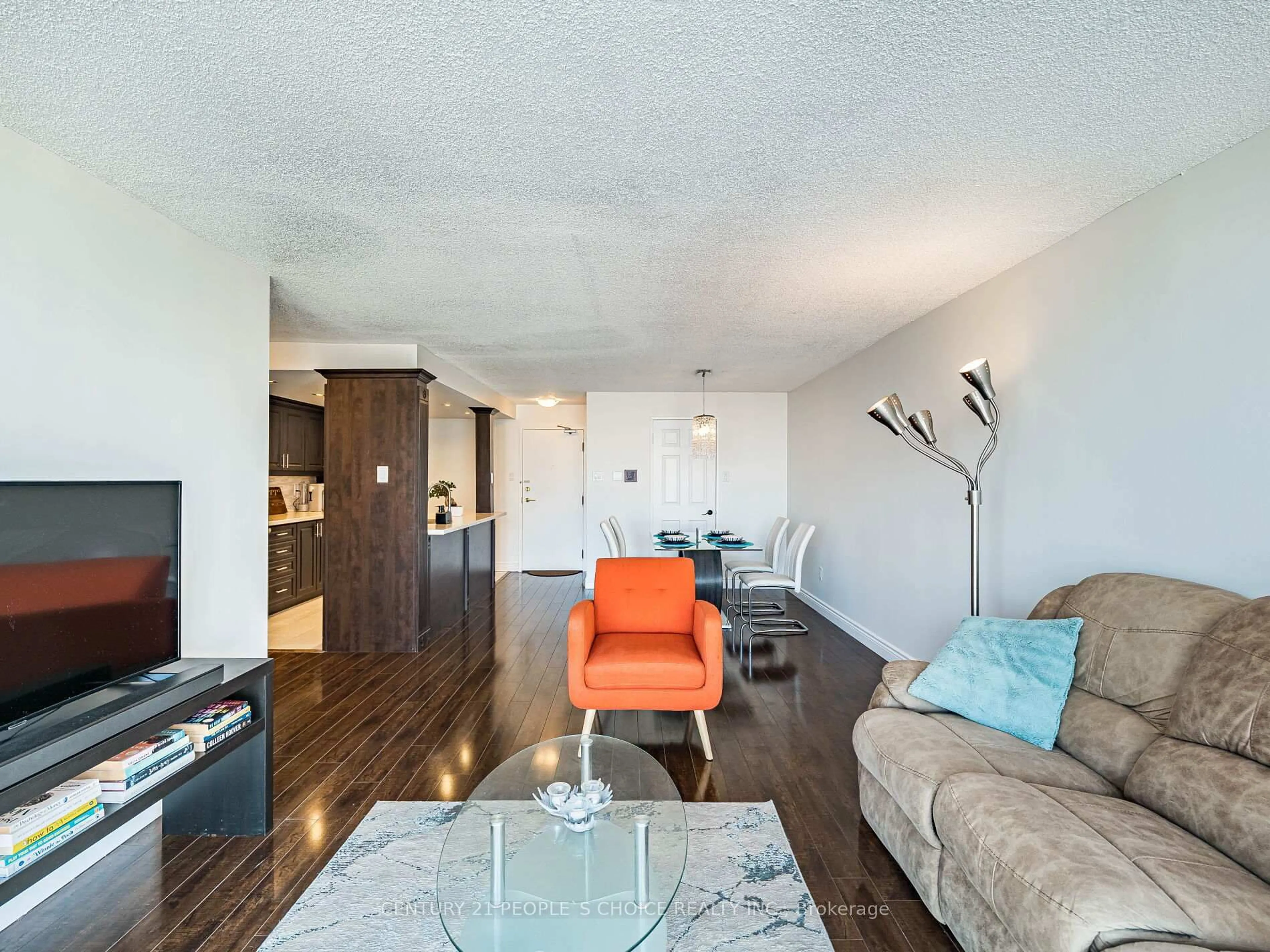 Living room with furniture, wood/laminate floor for 4205 Shipp Dr #1805, Mississauga Ontario L4Z 2Y9