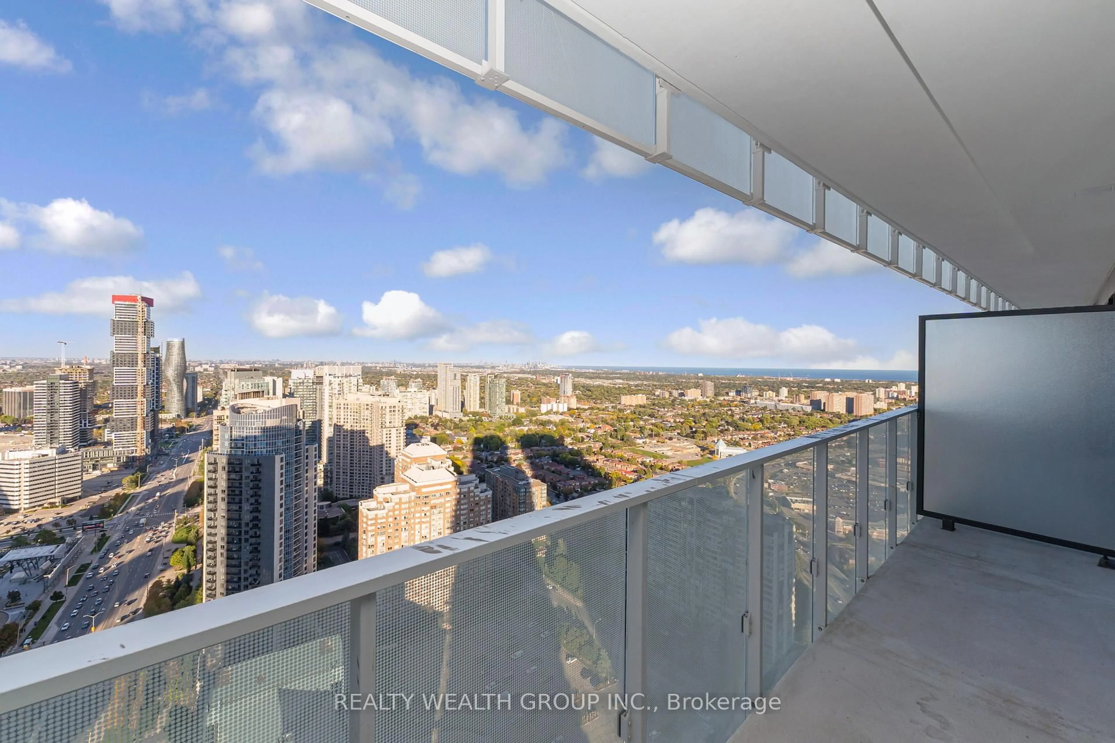 Balcony in the apartment, city buildings view from balcony for 3900 Confederation Pkwy #3911, Mississauga Ontario L5B 0M3