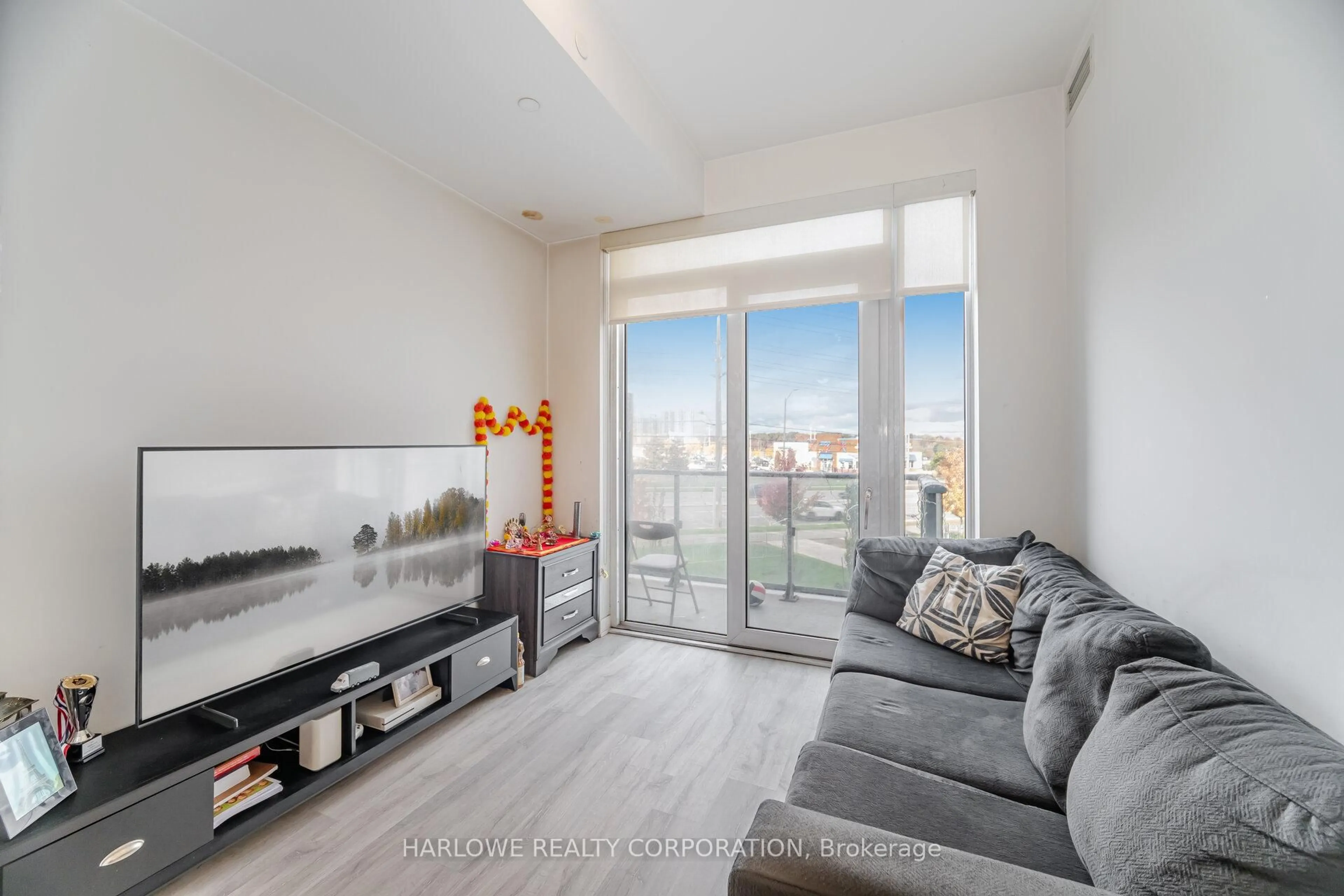 Living room with furniture, unknown for 4655 Metcalfe Ave #204, Mississauga Ontario L5M 0Z7