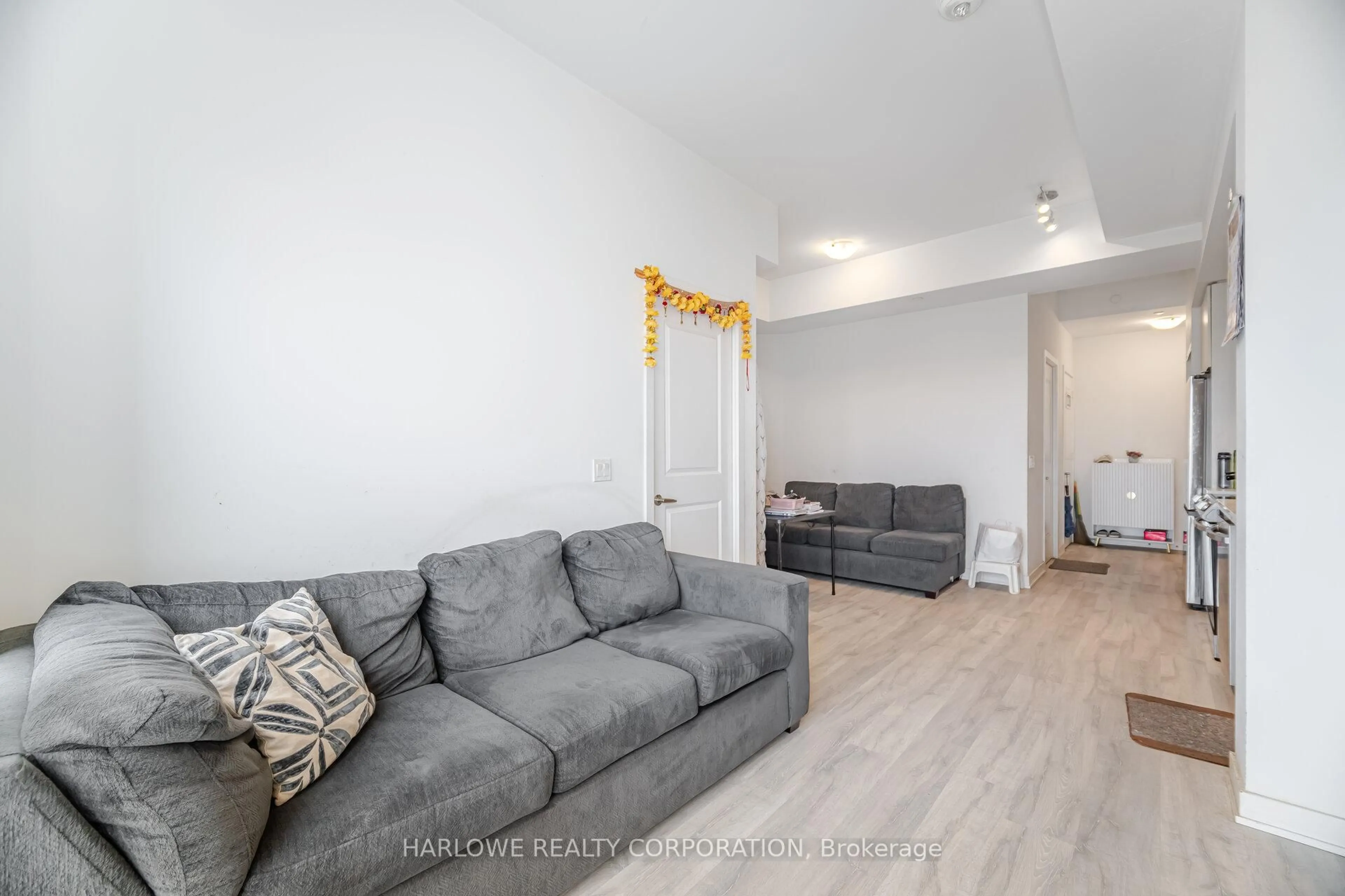 Living room with furniture, unknown for 4655 Metcalfe Ave #204, Mississauga Ontario L5M 0Z7